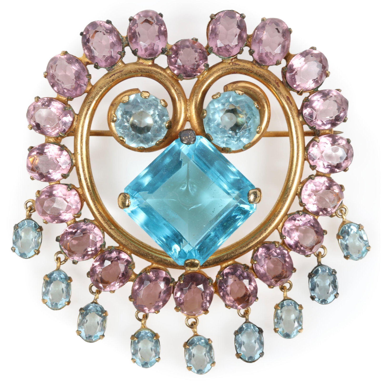 Fred A Block large retro heart-shaped brooch featuring a large central square blue stone with: Fred A Block large retro heart-shaped brooch featuring a large central square blue stone with dangling blue and pink stone drops Signed "Block" 3"H x 2 3/4"W