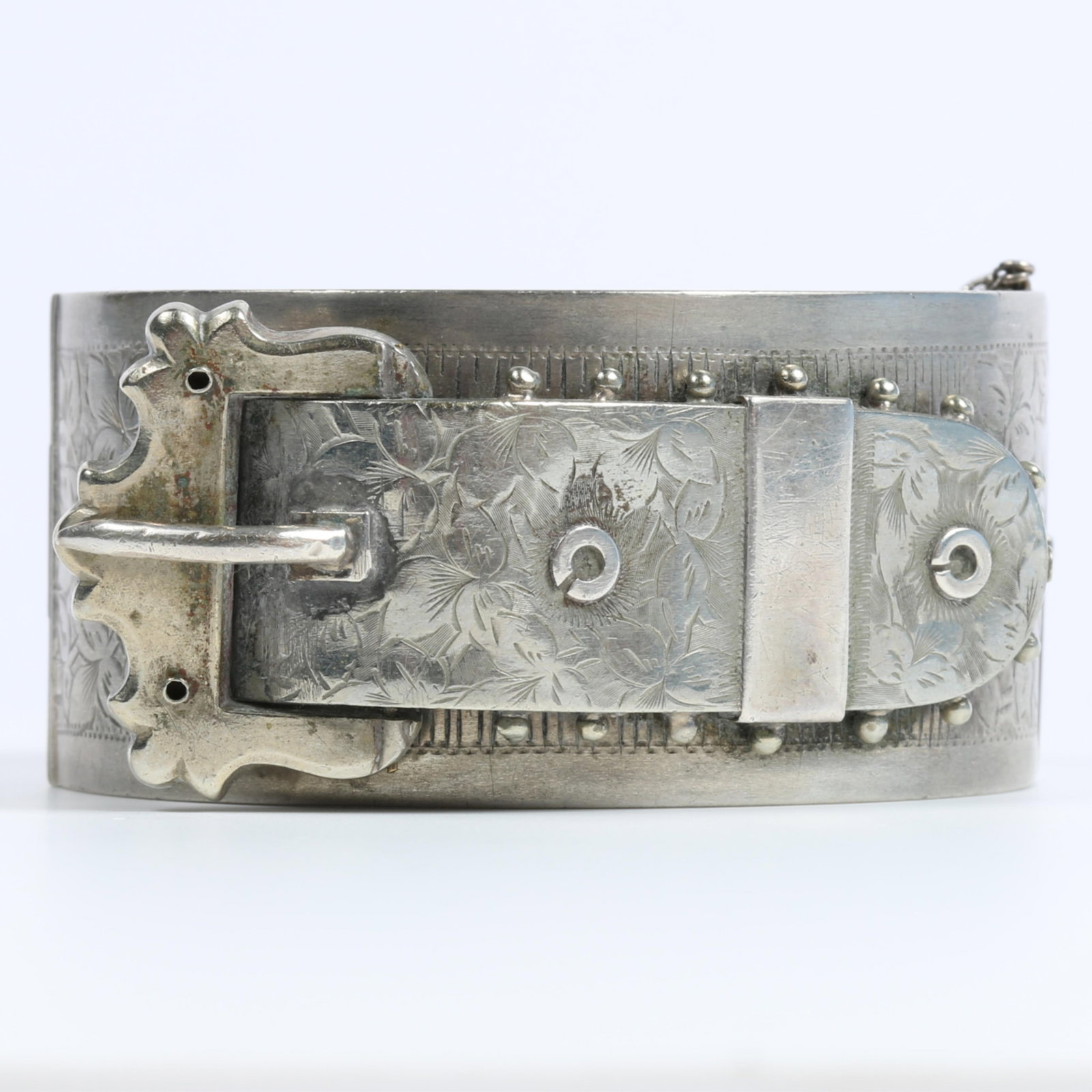 Victorian hinged buckle bracelet with intricate beaded and engraved decoration 1 1/4"H x 2 1/4"Inner: Victorian hinged buckle bracelet with intricate beaded and engraved decoration 1 1/4"H x 2 1/4"Inner Diam.