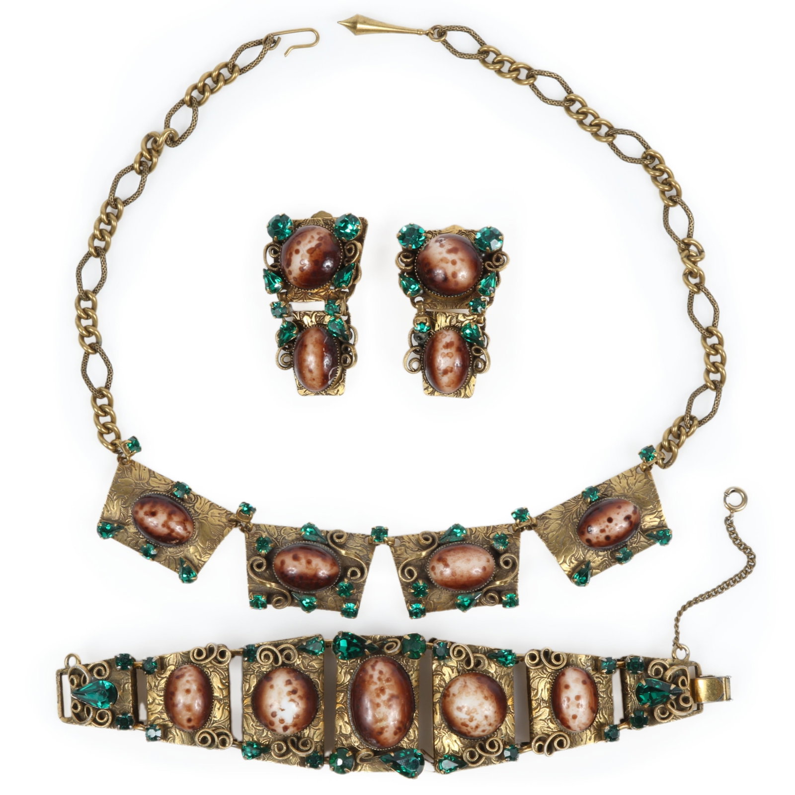 Mid century dimensional book piece parure with speckled egg cabochons and green rhinestone crystals.: Mid century dimensional book piece parure with speckled egg cabochons and green rhinestone crystals. Includes necklace, bracelet, and earrings "Fabulous Fakes" by Carole Tanenbaum, pg. 142 18"L x 7/8"