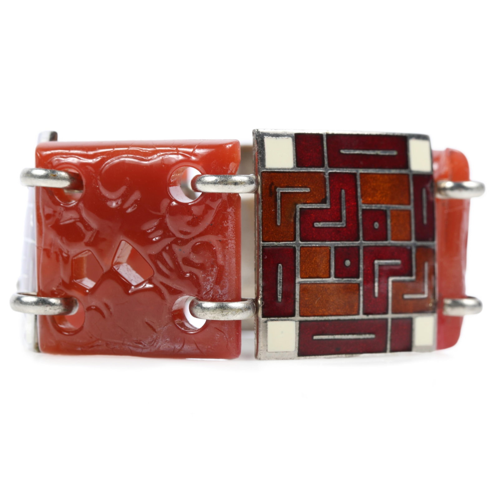 German? Art Deco Machine Age bracelet with geometric enameled design and molded carnelian glass: German? Art Deco Machine Age bracelet with geometric enameled design and molded carnelian glass panels "Fabulous Fakes" by Carole Tanenbaum, pg. 57 Chip on back of one carnelian panel 7"L x 1 1/8"W