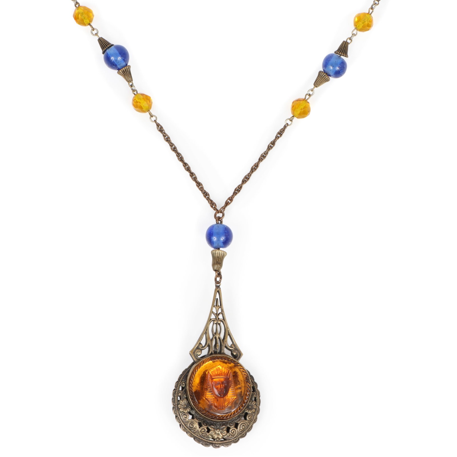 Egyptian Revival Czech glass book piece necklace with double sided pharaoh head pendant and: Egyptian Revival Czech glass book piece necklace with double sided pharaoh head pendant and intricate brass filigree and glass beaded chain "Fabulous Fakes" by Carole Tanenbaum, pg. 28 32"L x 4"Drop