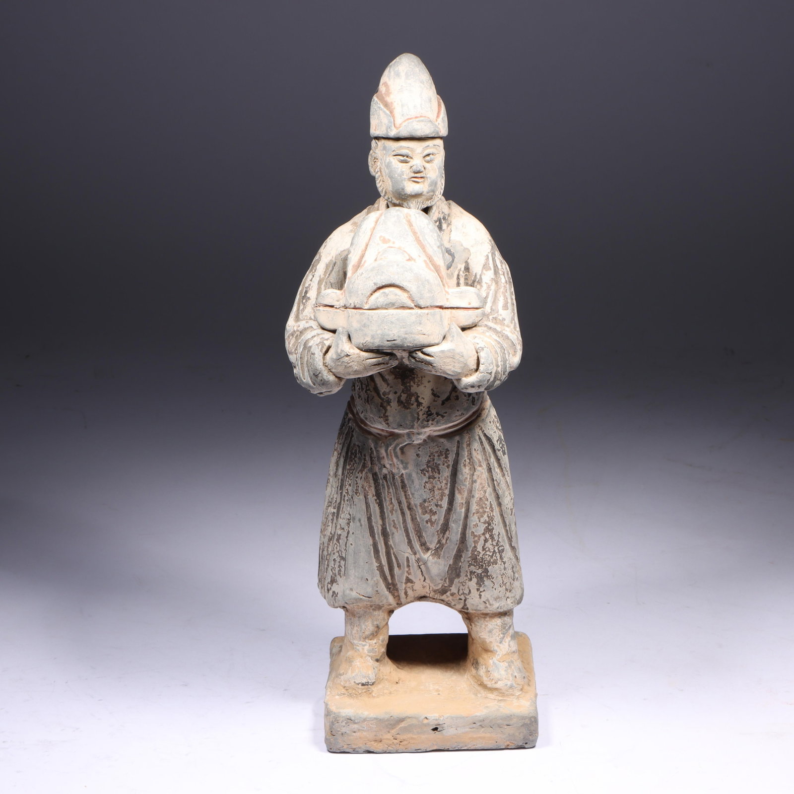 Chinese Tang / Ming Dynasty polychrome terracotta pottery mingqi court official tomb attendant: Chinese Tang / Ming Dynasty polychrome terracotta pottery mingqi court official tomb attendant figure dating from approximately 618-907 AD.