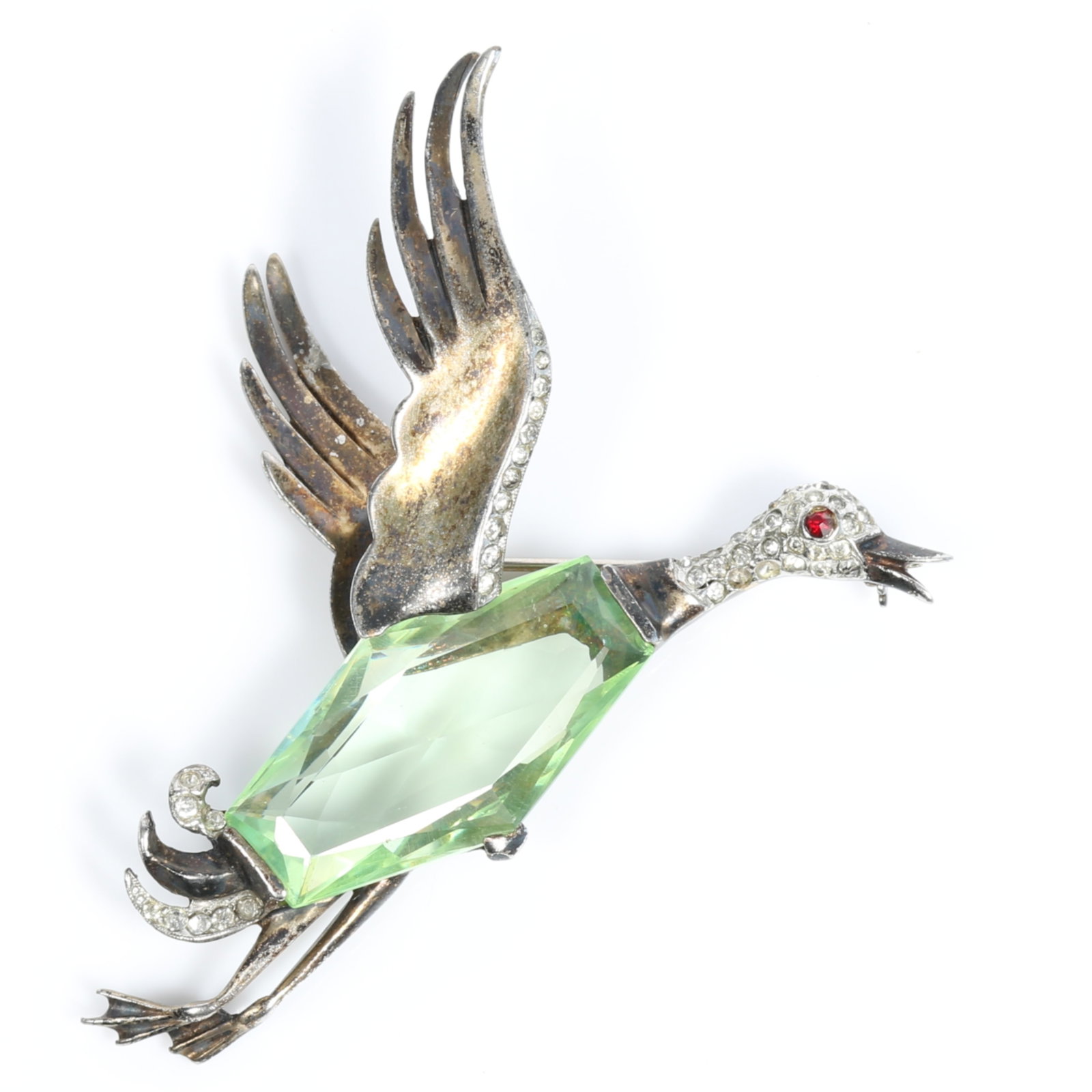 Rare Trifari Alfred Philippe sterling vermeil flying duck bird brooch with green jewel belly, red: Rare Trifari Alfred Philippe sterling vermeil flying duck bird brooch with green jewel belly, red eye, pave rhinestone head and tail feathers Missing several rhinestone crystals on the head and wear t