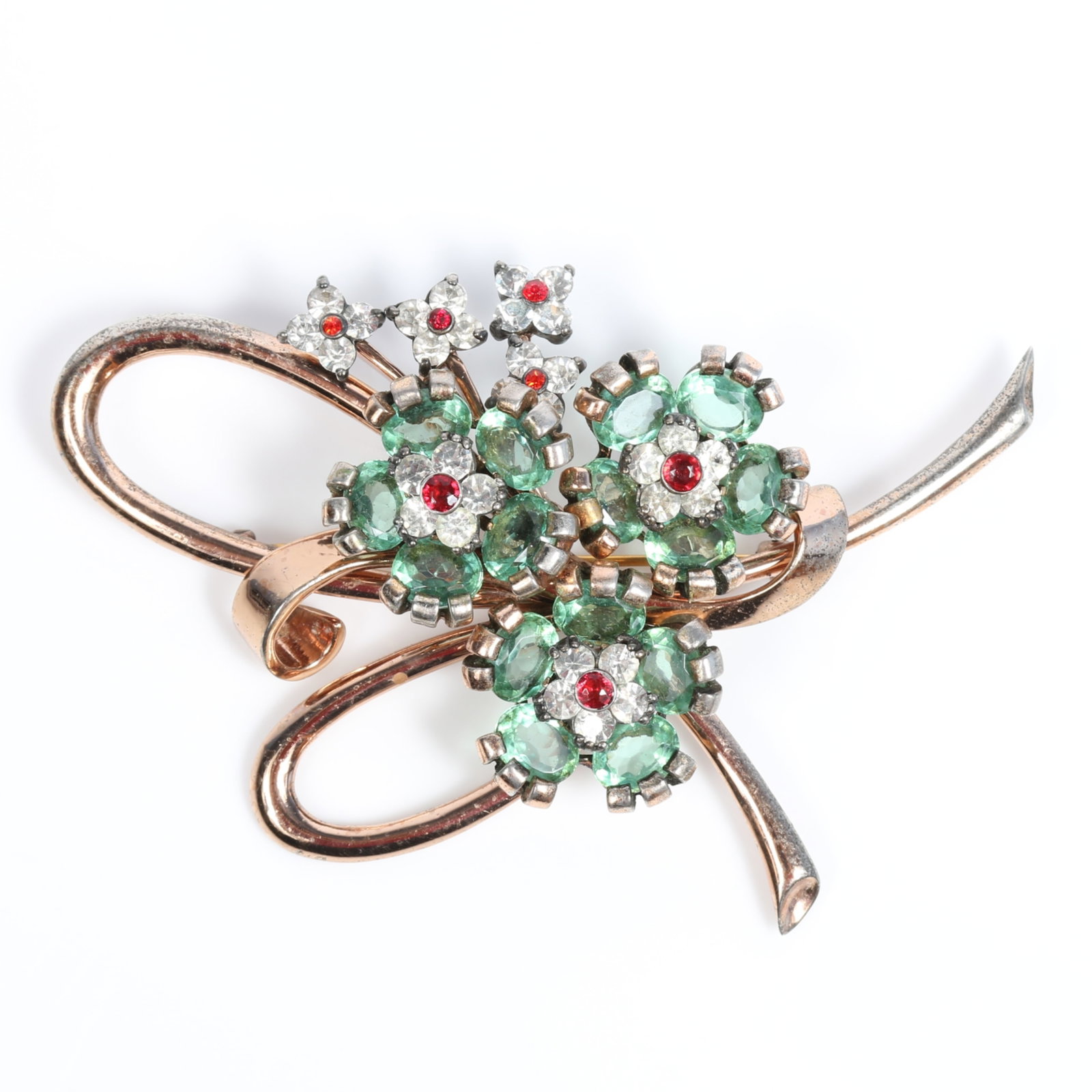 Pennino sterling vermeil floral brooch with mint green rhinestone crystals and clear and red crystal: Pennino sterling vermeil floral brooch with mint green rhinestone crystals and clear and red crystal accents hand inscribed: "88-847 R-Ore" Provenance: From the private collection of Dr. Claudia Brodh