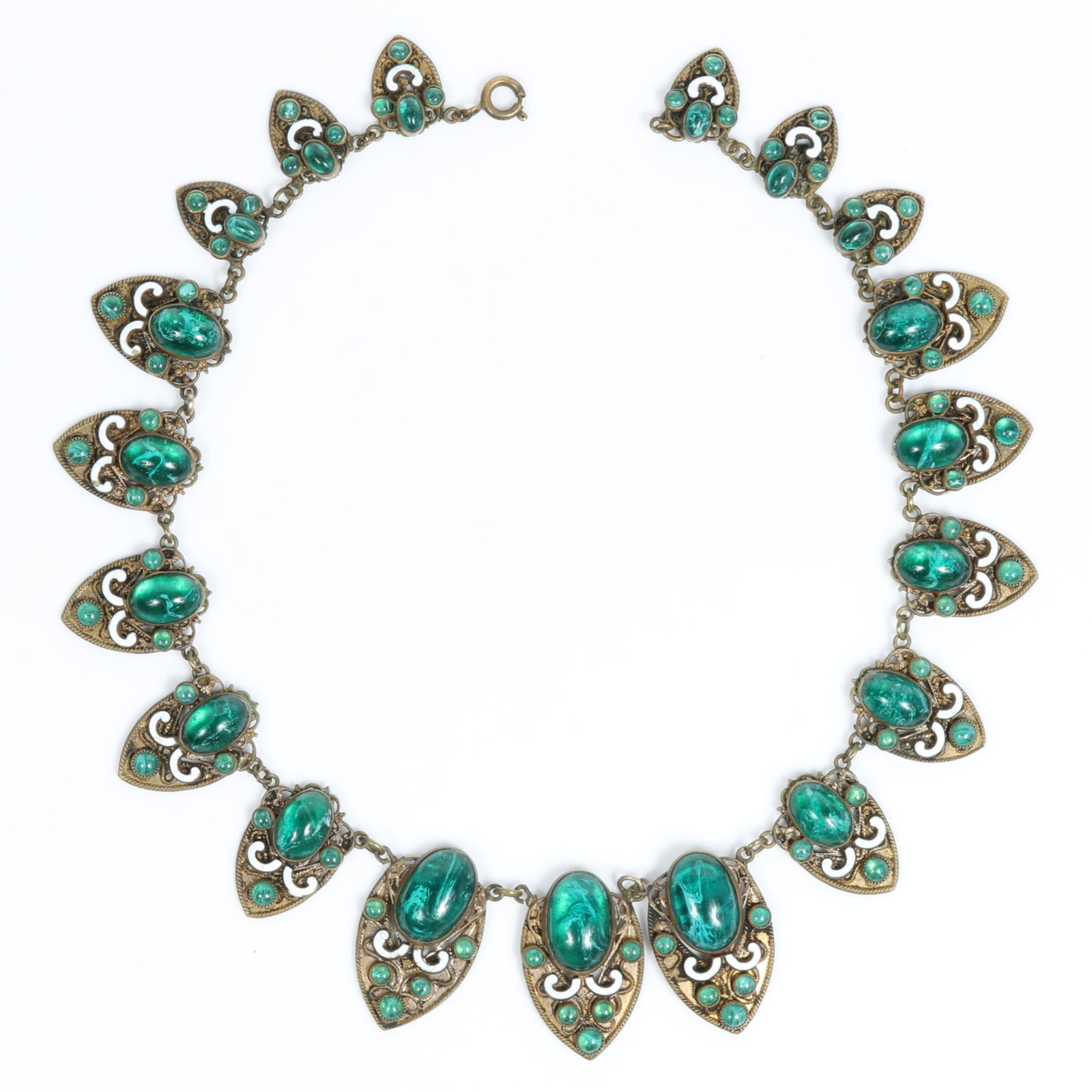 Czech green swirled art glass cabochon and enamel choker necklace 15"L x 1 1/4"W: Czech green swirled art glass cabochon and enamel choker necklace One of the links has a kink in it Provenance: From the private collection of Dr. Claudia Brodhead 15"L x 1 1/4"W