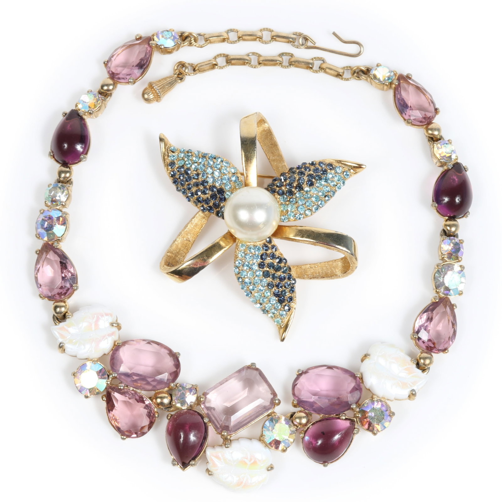 Schiaparelli 2pc group: necklace with pale amethyst crystals, cabachons, and opaque leaf motif with (1 of 16)