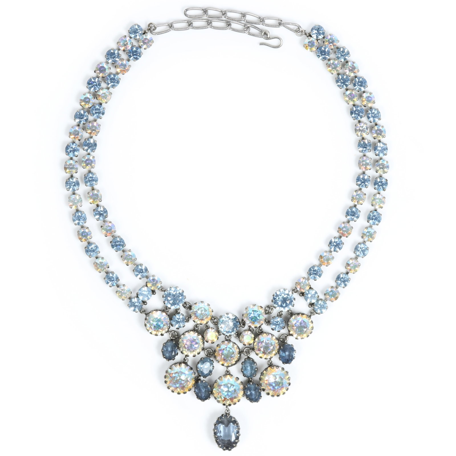Austrian? CIS? Aurora Borealis and blue rhinestone crystal cascading necklace featuring oval pendant: Austrian? CIS? Aurora Borealis and blue rhinestone crystal cascading necklace featuring oval pendant drop jewel Provenance: From the private collection of Dr. Claudia Brodhead 18"L - 20"L, adjustable 