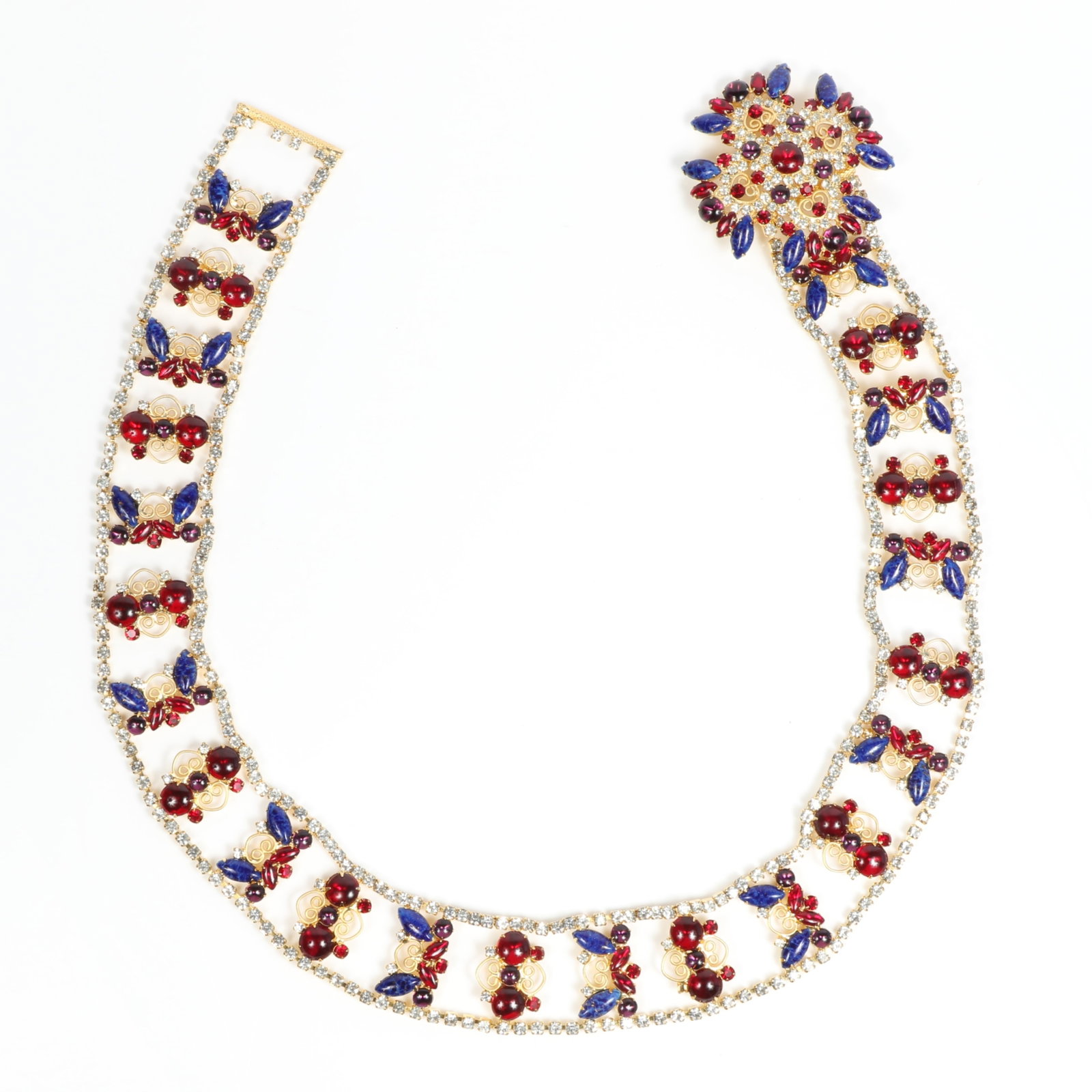 Schreiner or Juliana glass and crystal rhinestone links jeweled belt with centerpiece focal clasp 29: Schreiner or Juliana glass and crystal rhinestone links jeweled belt with centerpiece focal clasp Provenance: From the private collection of Dr. Claudia Brodhead 29 1/2"L x 1 1/2"W