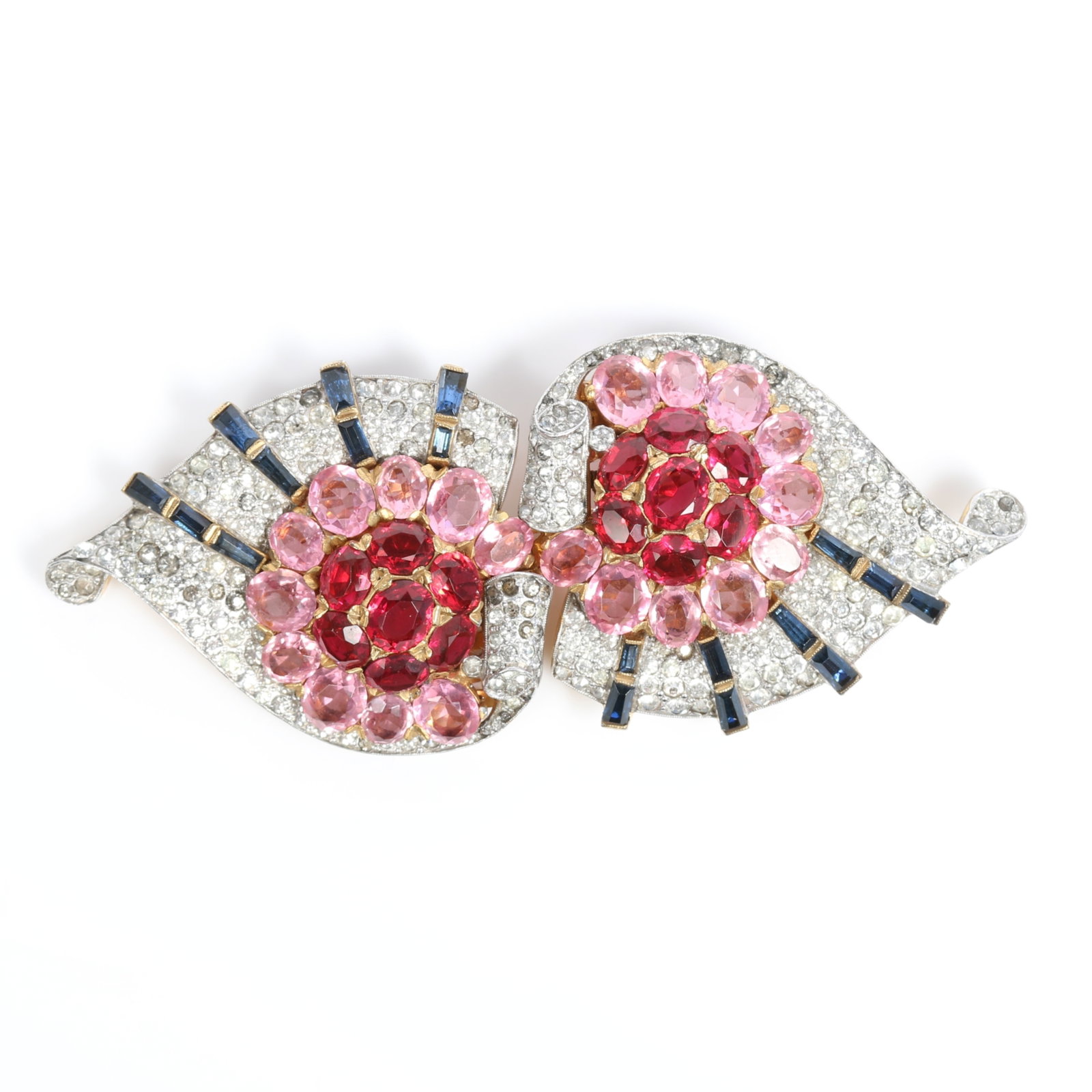 Rare Trifari Alfred Phillipe double dress clip mate duette brooch with bright red and pink: Rare Trifari Alfred Phillipe double dress clip mate duette brooch with bright red and pink rhinestone crystals, blue baguette accents, and pave A few darkened stones Provenance: From the private colle