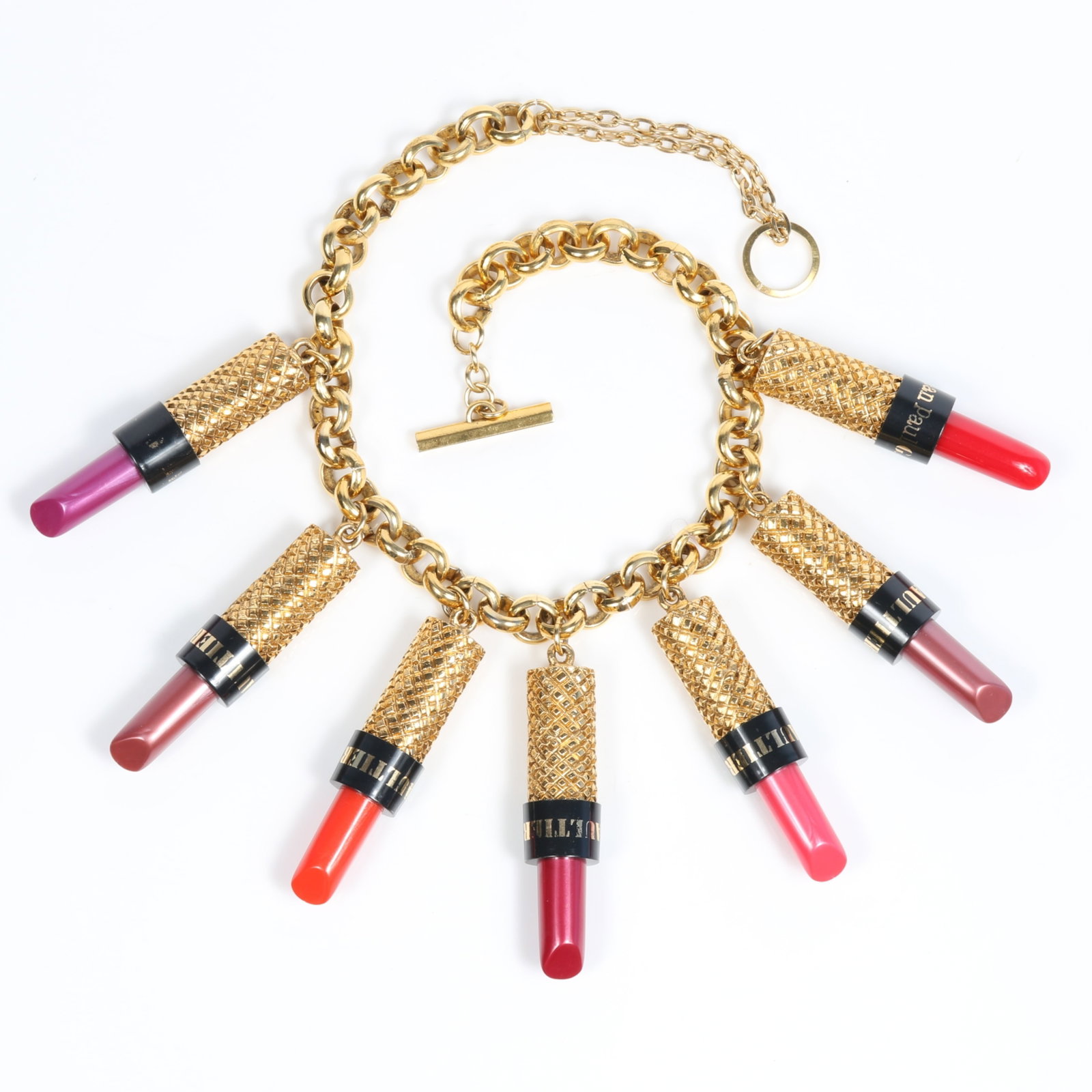 Jean Paul Gaultier vintage 1980's French couture life size lipstick necklace with heavy gold-tone: Jean Paul Gaultier vintage 1980's French couture life size lipstick necklace with heavy gold-tone chain Provenance: From the private collection of Dr. Claudia Brodhead 20"L x 3 7/8" Drop