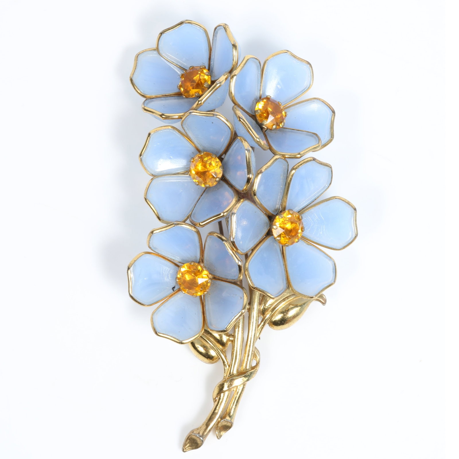 Gigantic Trifari Alfred Philippe poured blue floral glass and bright yellow rhinestone crystal fur: Gigantic Trifari Alfred Philippe poured blue floral glass and bright yellow rhinestone crystal fur clip, unsigned Provenance: From the private collection of Dr. Claudia Brodhead 5 1/2" H x 2 3/4"W