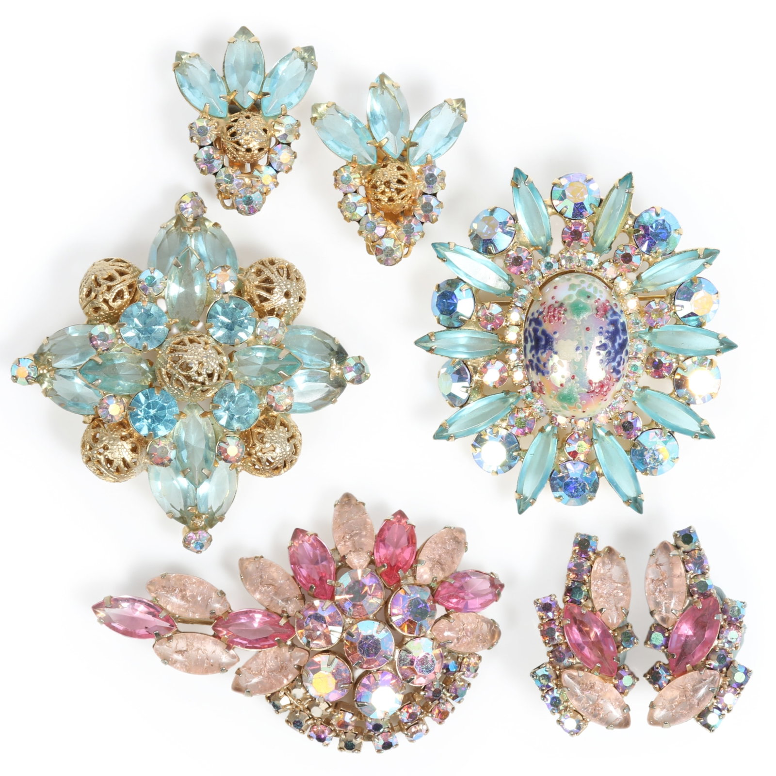 Juliana Easter egg brooch with blue navette stones, and pink and blue brooches with matching: Juliana Easter egg brooch with blue navette stones, and pink and blue brooches with matching earrings in soft pastel pinks, blues accented with AB stones The center stone on the easter egg pendant has