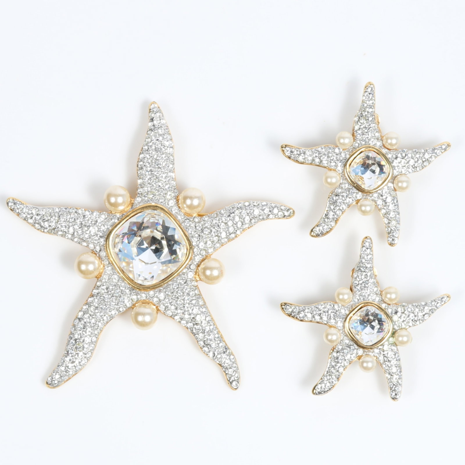 Valentino diamante pave encrusted brooch and earring set with large rhinestone crystals and faux: Valentino diamante pave encrusted brooch and earring set with large rhinestone crystals and faux pearls Provenance: From the private collection of Dr. Claudia Brodhead 4"H x 4"W (brooch)