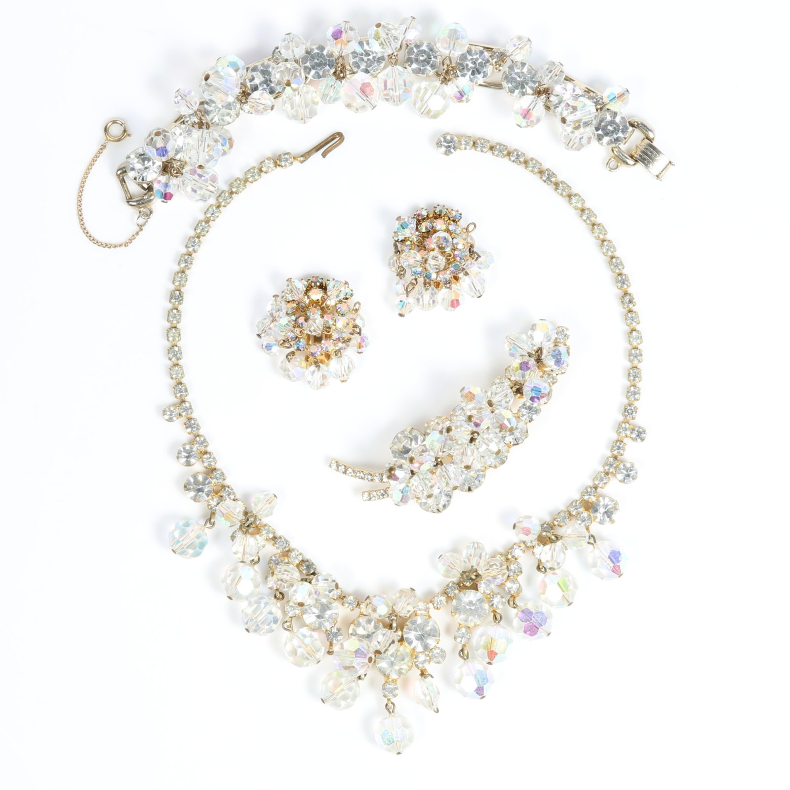 Juliana gold-tone grand parure with AB faceted dangle beads and rhinestone crystals 6 1/2"L x 3/4"W: Juliana gold-tone grand parure with AB faceted dangle beads and rhinestone crystals Provenance: From the private collection of Dr. Claudia Brodhead 6 1/2"L x 3/4"W (bracelet)