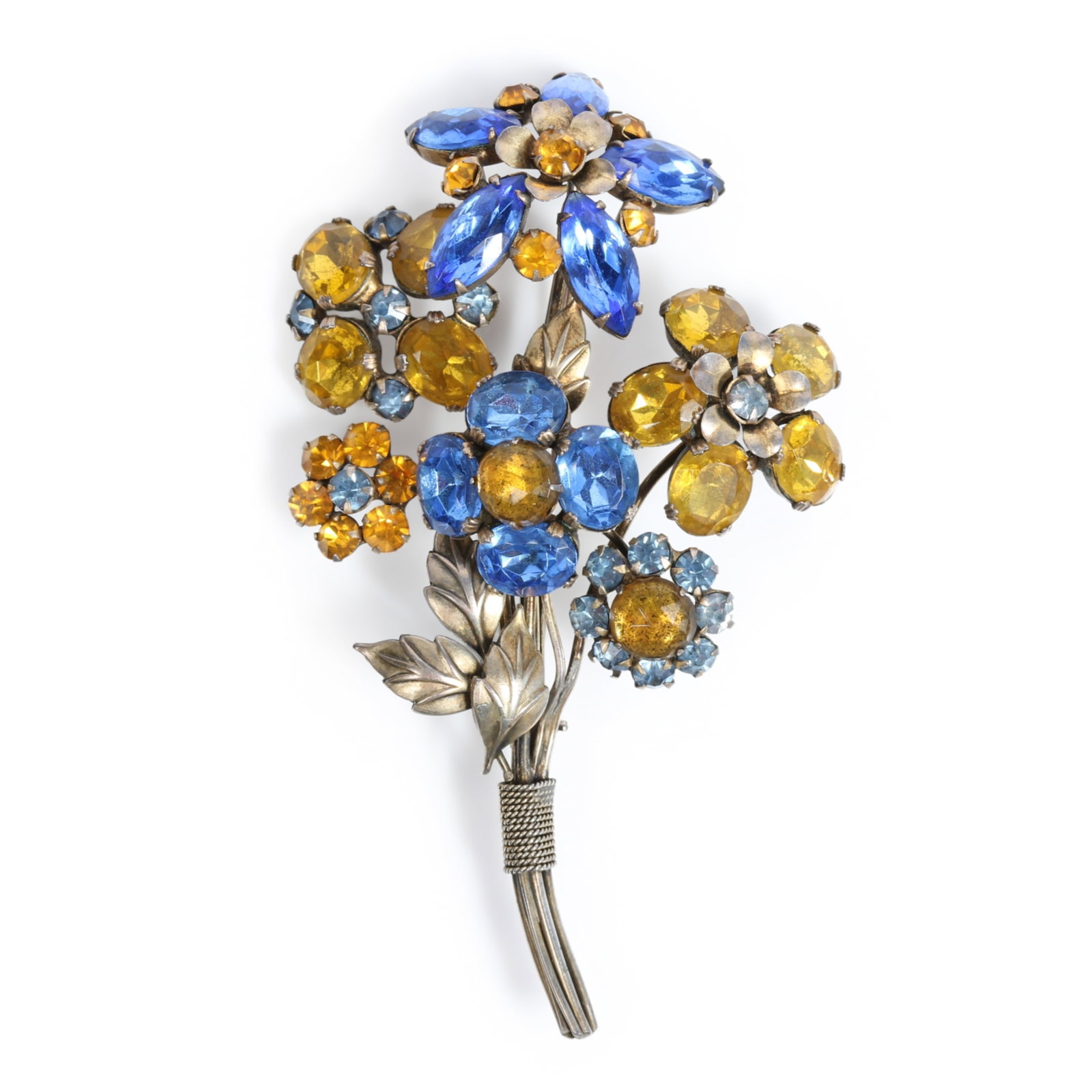 Sandor sterling silver bright blue, sky blue, and yellow rhinestone floral bouquet brooch 4"H x 2: Sandor sterling silver bright blue, sky blue, and yellow rhinestone floral bouquet brooch Provenance: From the private collection of Dr. Claudia Brodhead 4"H x 2 1/4"W