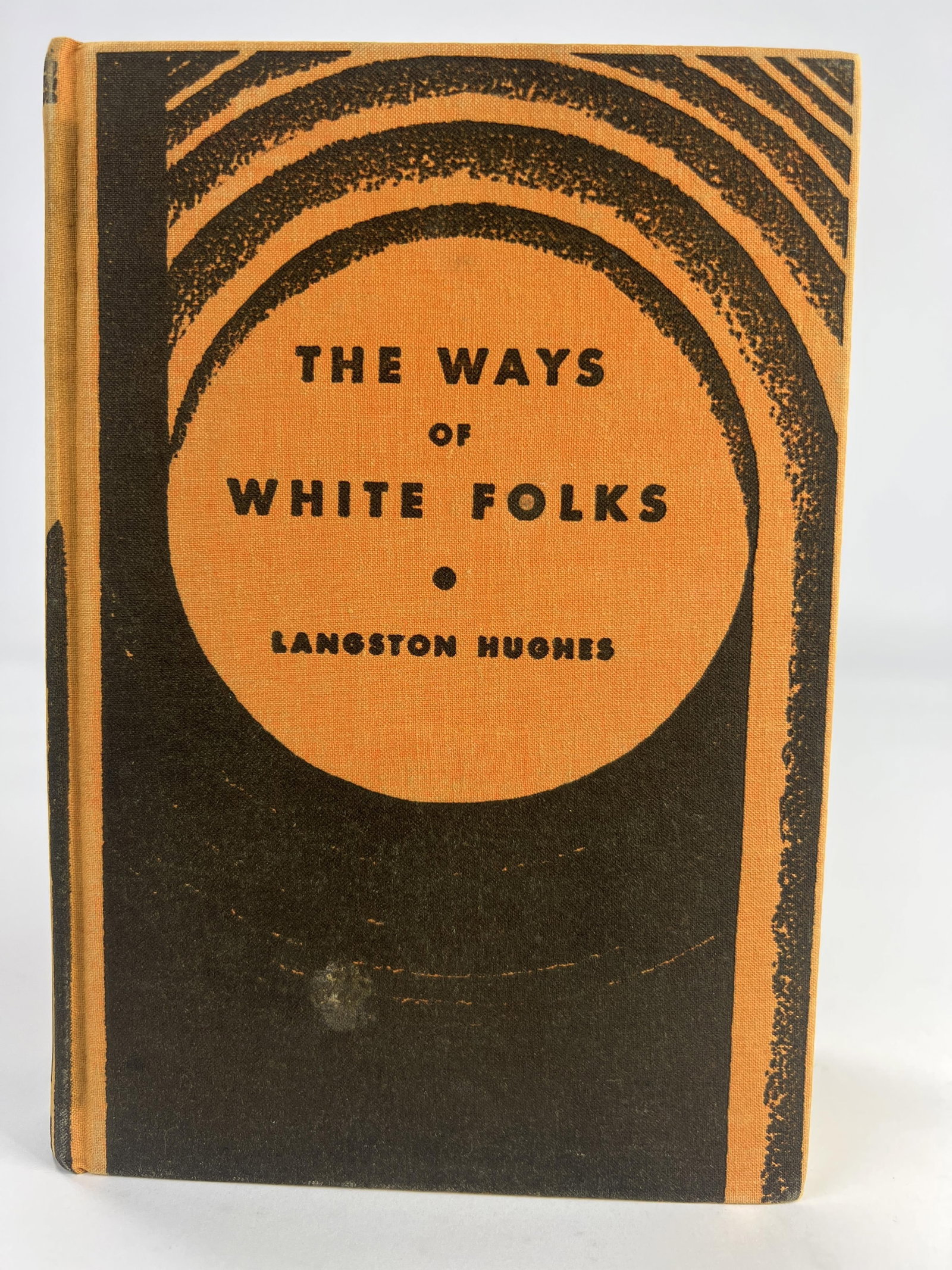 A first edition, second printing hardcover copy of The Ways of White Folks by Langston Hughes,: A first edition, second printing hardcover copy of The Ways of White Folks by Langston Hughes, published by Alfred A. Knopf in 1935 with its distinctive orange and black cloth cover, 7 1/2? x 5 1/2? x