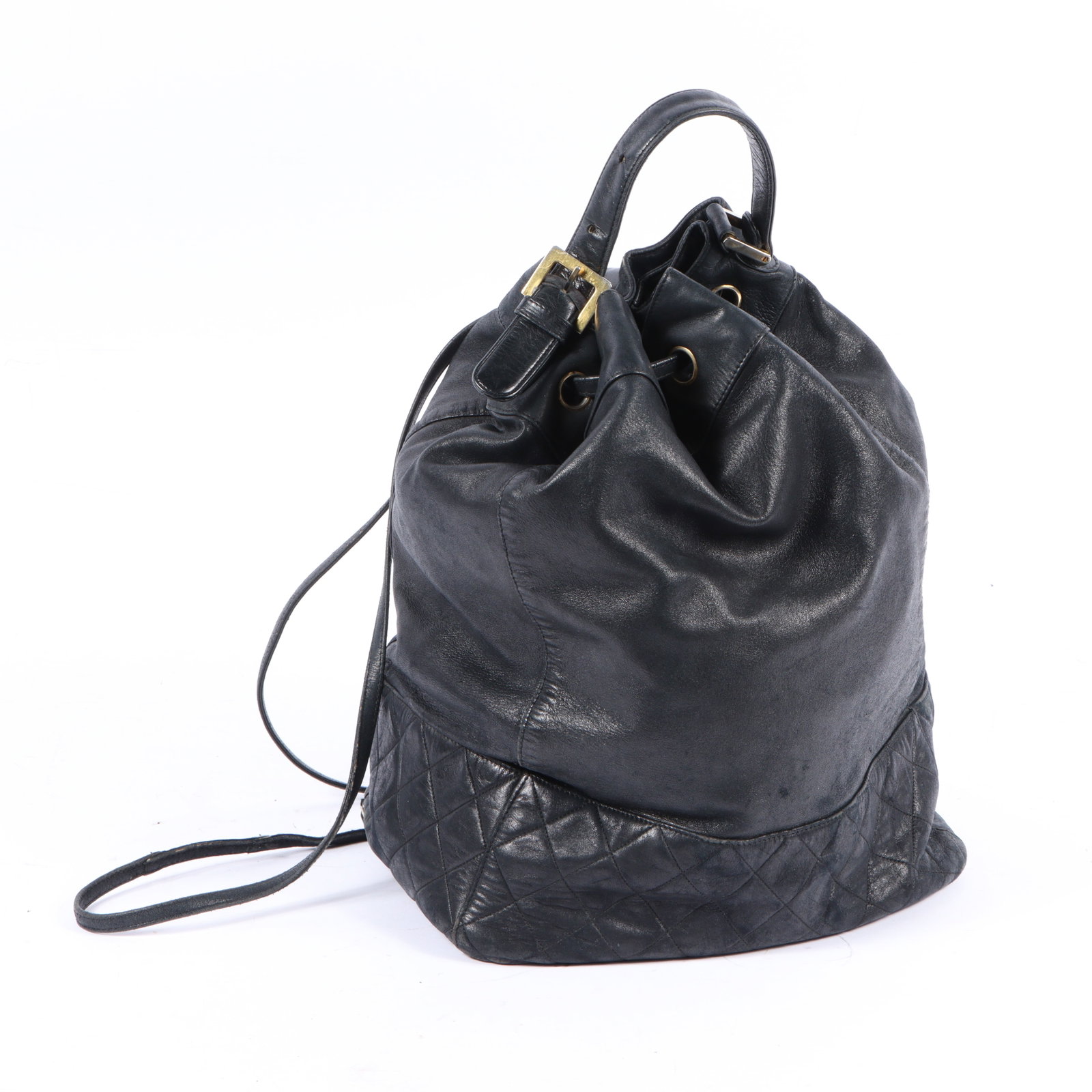 Chanel Caviar LARGE Quilted Drawstring Backpack black leather bag with attached interior zipper: Chanel Caviar LARGE Quilted Drawstring Backpack black leather bag with attached interior zipper pouch. A black leather drawstring backpack with quilted detailing, featuring gold-tone hardware and adju