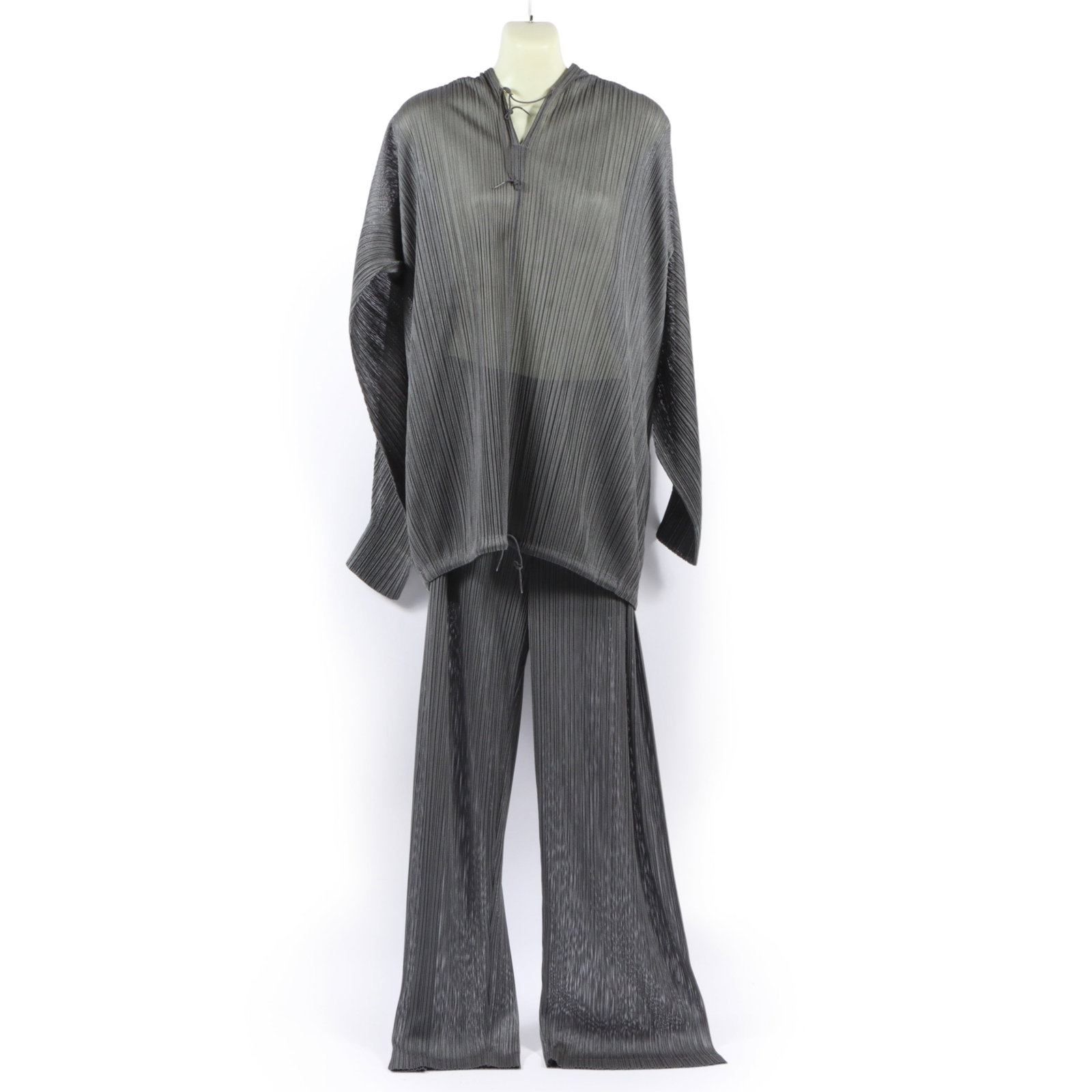 Issey Miyake "Pleats Please" long sleeve hooded top & pant set 23" pit to pit, 21" center front to: Issey Miyake "Pleats Please" long sleeve hooded top & pant set A pleated top and pant set from the 'Pleats Please' collection by Issey Miyake, featuring a metallic sheen and origami-inspired design. T