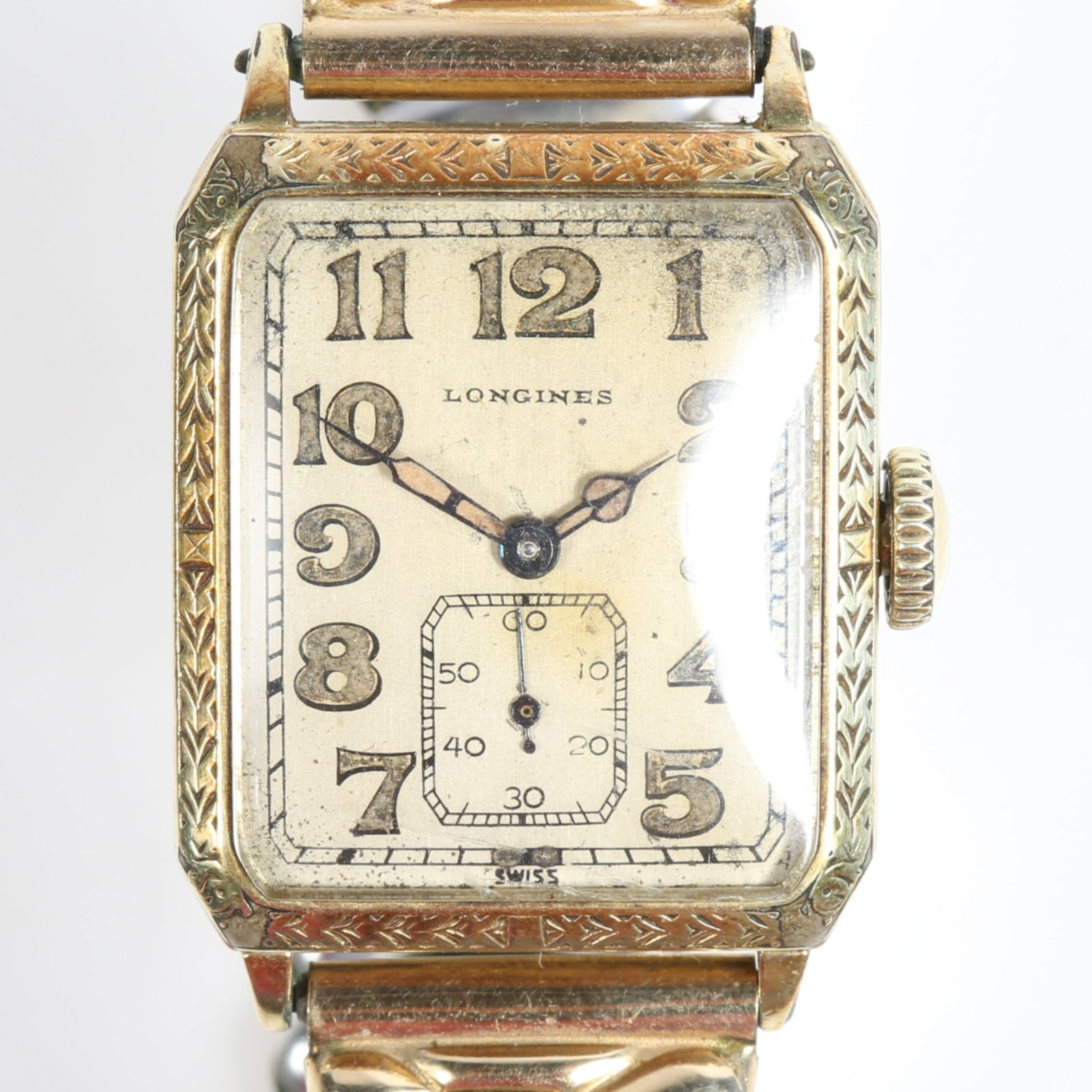 Longines Swiss 1920s Art Deco gold-tone engraved wristwatch with Arabic numerals and sub seconds: Longines Swiss 1920s Art Deco gold-tone engraved wristwatch with Arabic numerals and sub seconds dial, running 24mm x 28mm, case