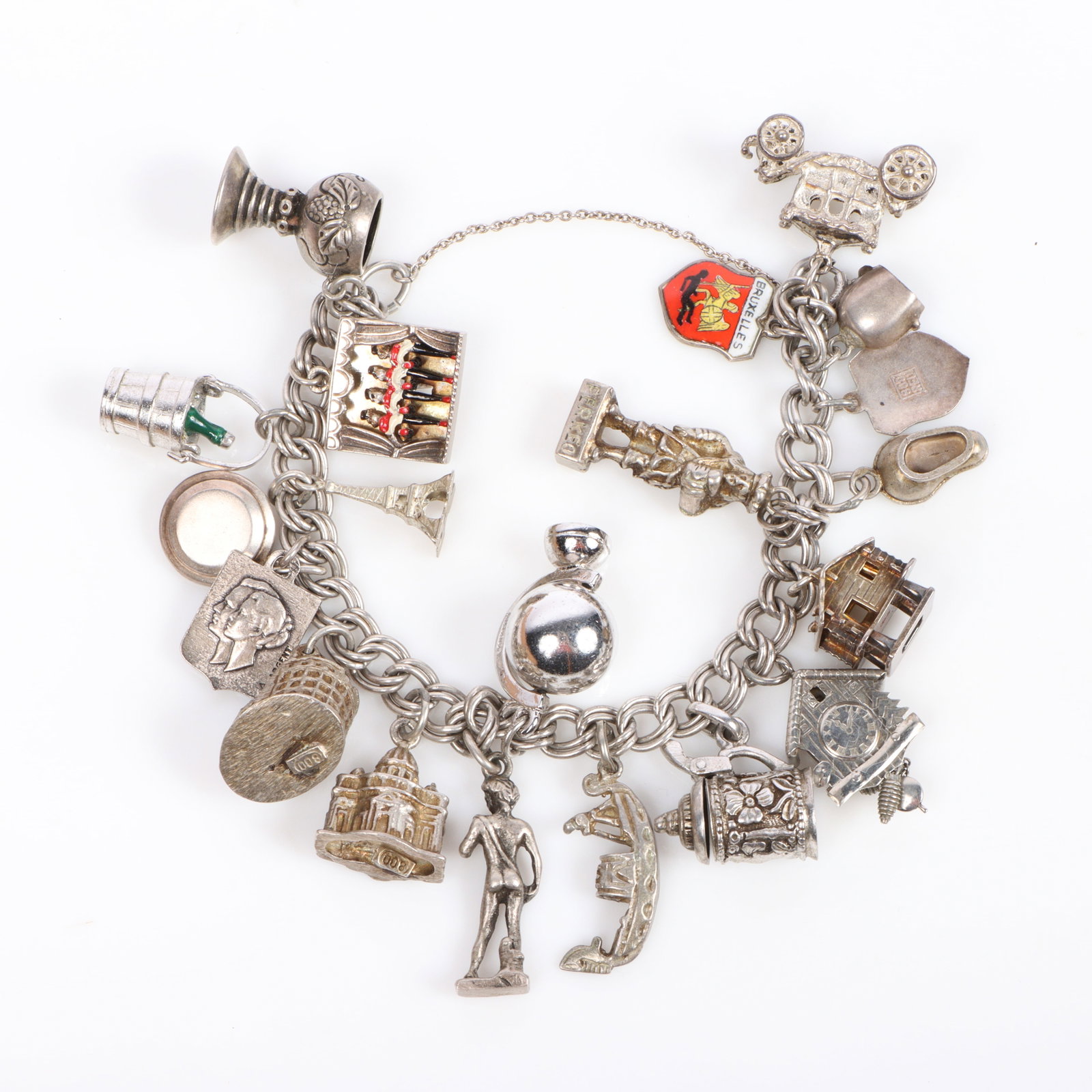 Vintage sterling silver bracelet with 19 charms some sterling, some mechanical, European travel (1 of 5)