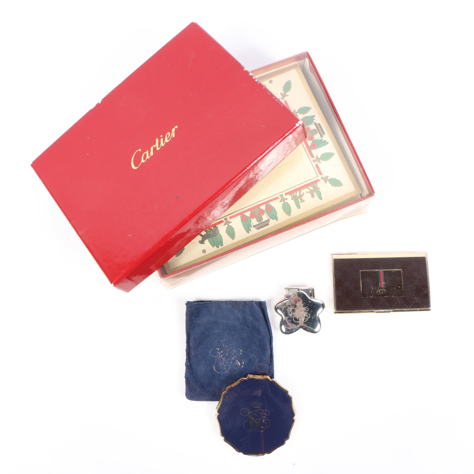 Collection of Designer Accessories including Venice Simplon Orient-Express monogram blue enamel: Collection of Designer Accessories including Venice Simplon Orient-Express monogram blue enamel compact in dust bag, VSOE silver tone star lighter, Gucci Firenze enameled metal buisness card holder, a