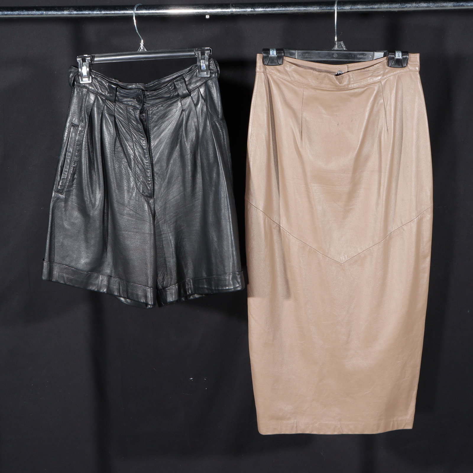 Vintage In Transit brown leather pencil skirt and Brioni Roma Italian black leather shorts 13: Vintage In Transit brown leather pencil skirt and Brioni Roma Italian black leather shorts Stain to front of skirt. 13 1/2"Waist x 19"Hips x 32"Waist to bottom hem; size 8 (skirt measured)