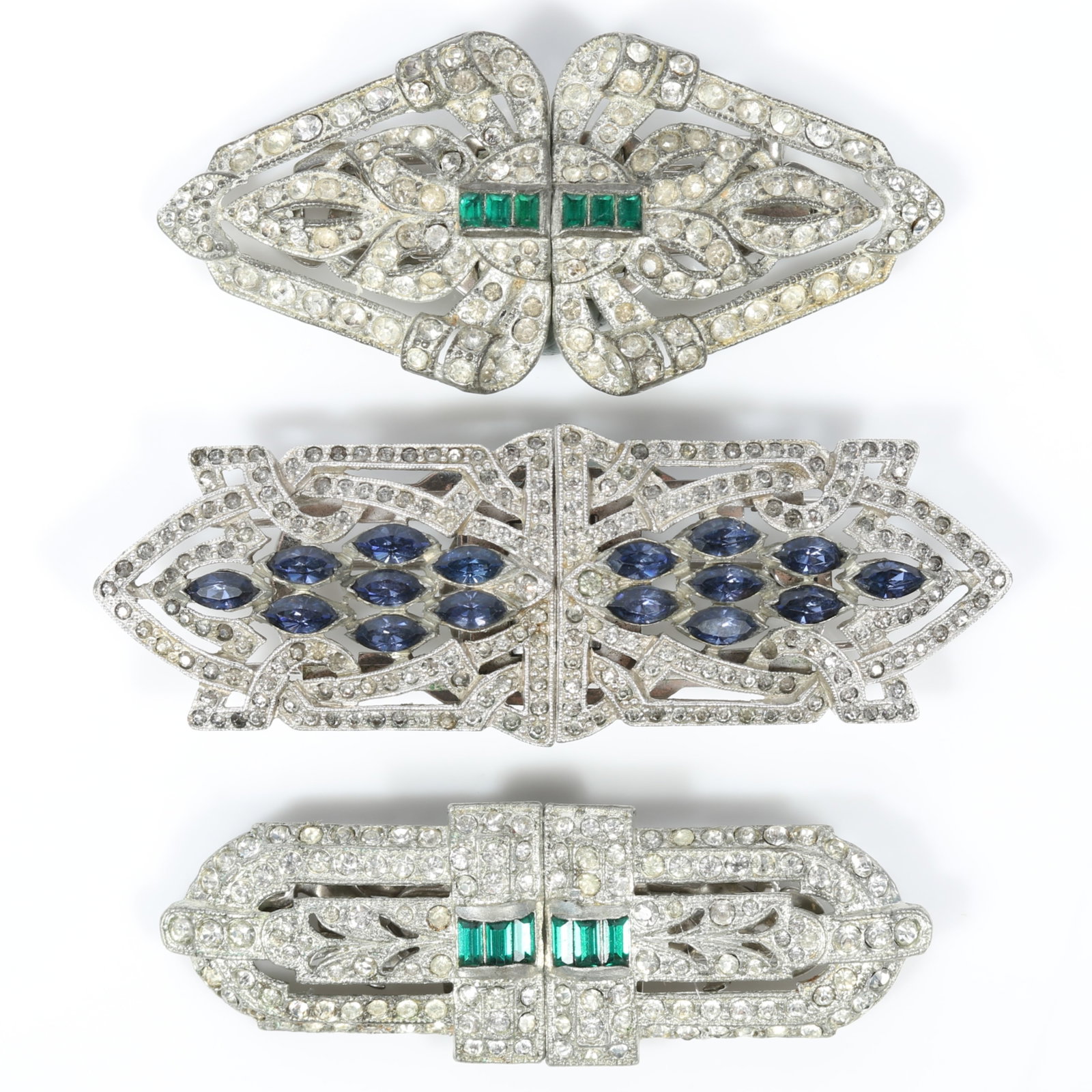 Early Coro Art Deco rhinestone duette brooches 3pc group including green, blue, and diamante jewels: Early Coro Art Deco rhinestone duette brooches 3pc group including green, blue, and diamante jewels Provenance: From the private collection of Dr. Claudia Brodhead 1"H x 3"W (center)
