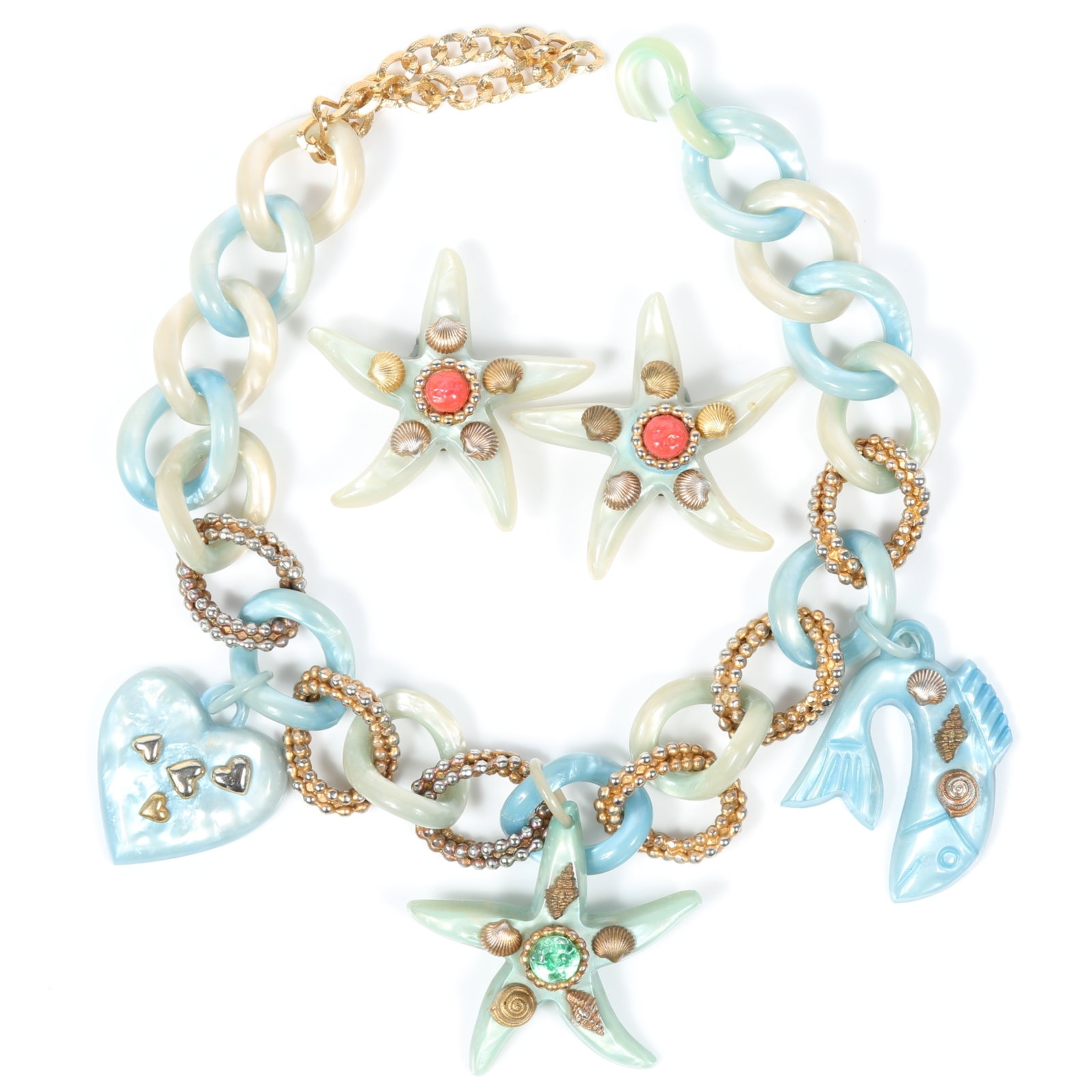 Dominique Aurientis Paris designer couture seashore themed iridescent resin charm necklace and: Dominique Aurientis Paris designer couture seashore themed iridescent resin charm necklace and matching earrings decorated with glass cabochons and tiny metal seashells Necklace is unsigned Provenance