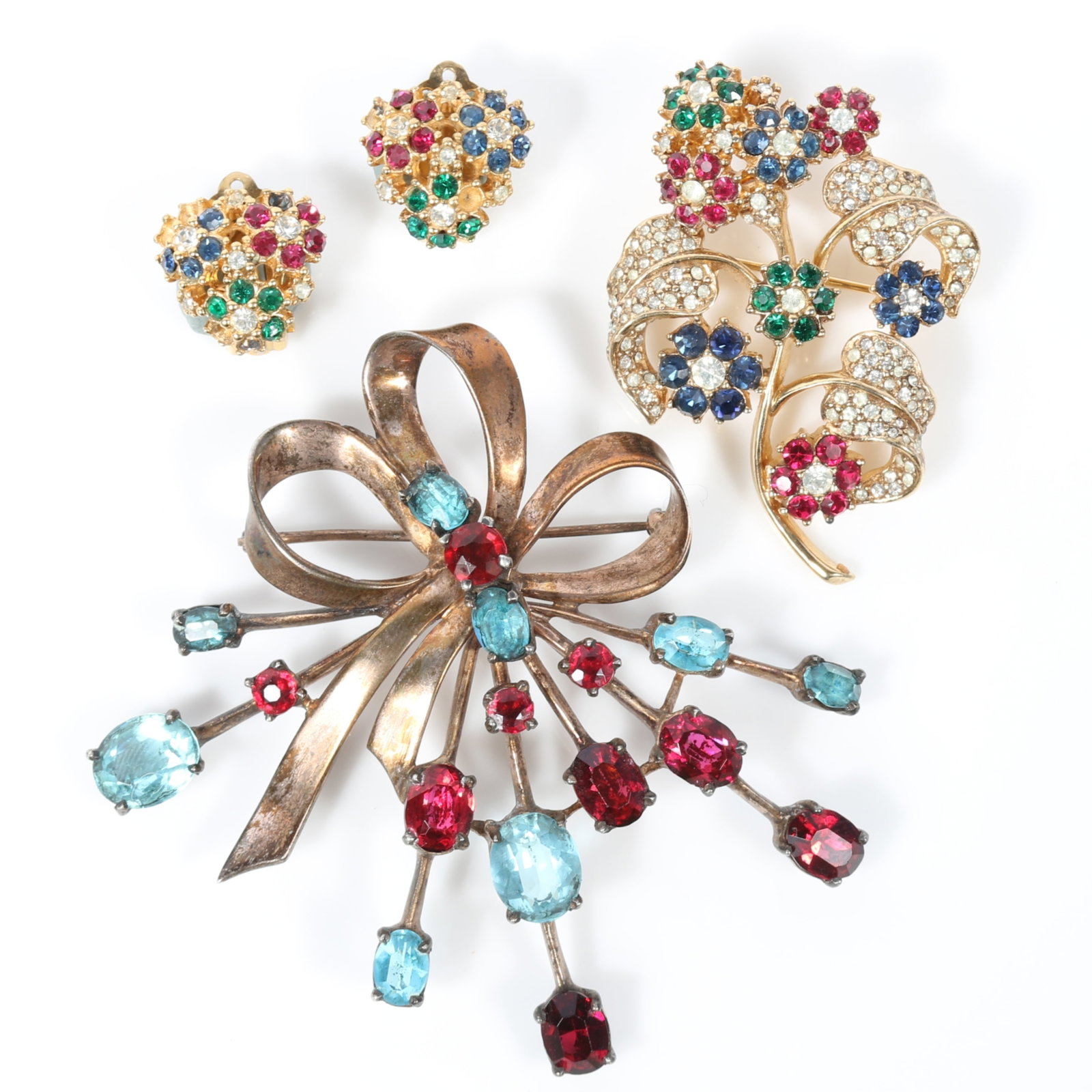 Ciner 3pc jewelry group including retro sterling vermeil bow brooch with blue and red rhinestones,: Ciner 3pc jewelry group including retro sterling vermeil bow brooch with blue and red rhinestones, and multi colored floral brooch with matching earrings 2 3/4"H x 2 3/4"W (sterling)