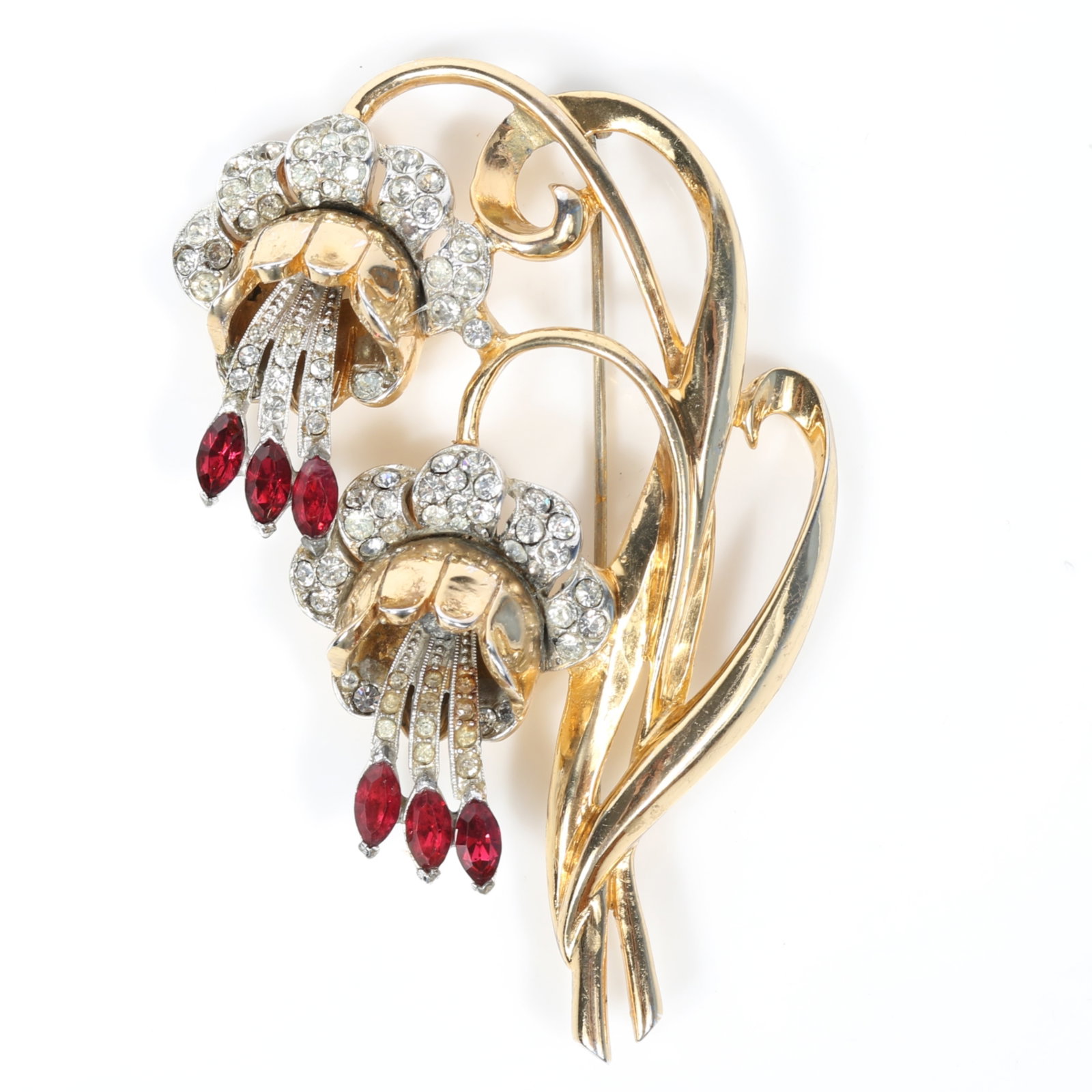 Coro large double bellflower or fuchsia brooch with gold wash, diamante rhinestones, and deep pink: Coro large double bellflower or fuchsia brooch with gold wash, diamante rhinestones, and deep pink marquis jewel drops Provenance: From the Collection of Joan Duran, owner of The Queen's Bedroom on Fa
