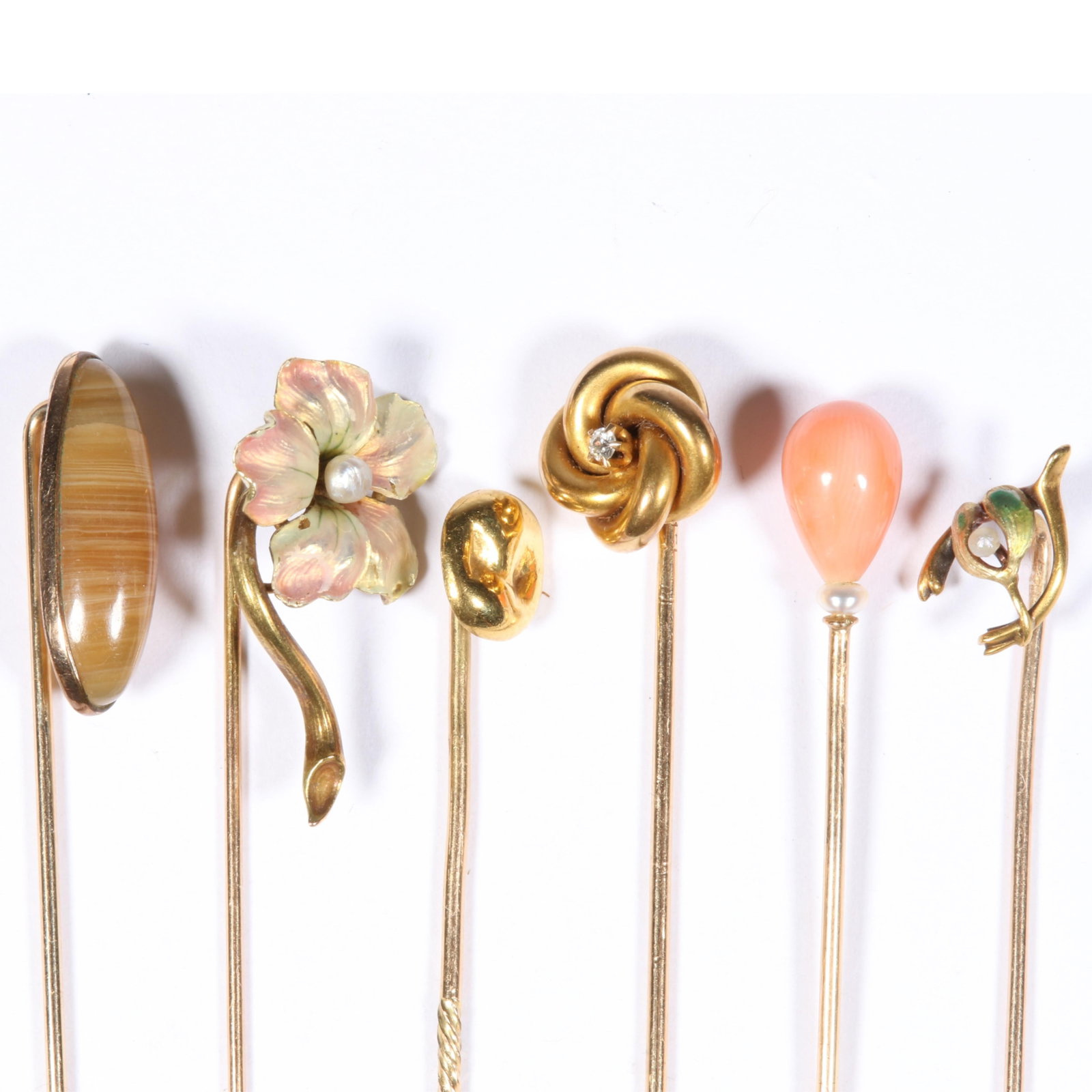 6pc 14K Yellow Gold Antique Stick Pin Group with Art Nouveau Painted Enamel Flower, Coral, Agate,: 6pc 14K Yellow Gold Antique Stick Pin Group with Art Nouveau Painted Enamel Flower, Coral, Agate, Seed Pearls, and Diamond, Marked and Unmarked, Tested 7.00dwt. total The oval agate cabochon has a cra