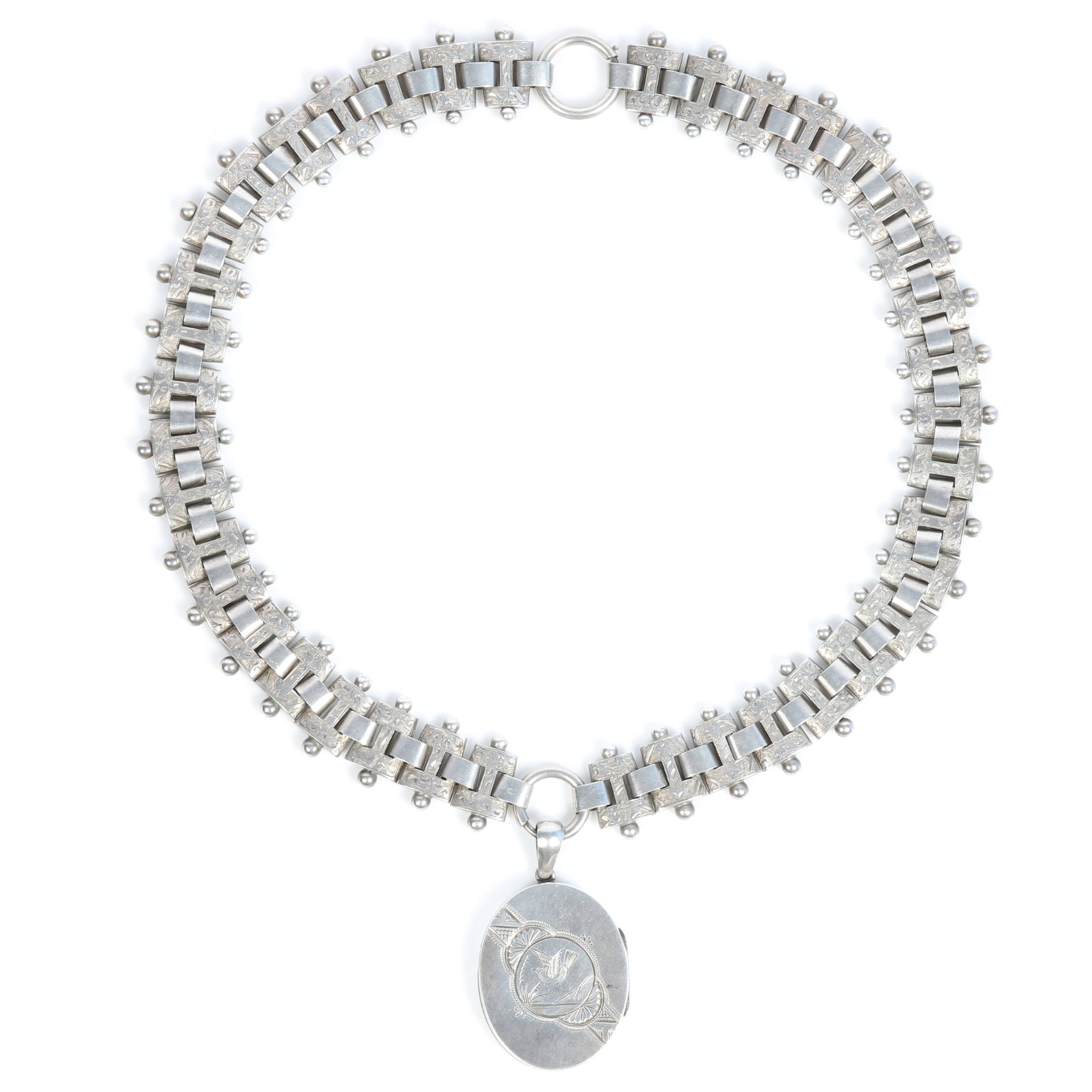 Victorian Aesthetic engraved book chain necklace with oval locket featuring a flying bird 16"L x 2: Victorian Aesthetic engraved book chain necklace with oval locket featuring a flying bird Provenance: From the Collection of Joan Duran, owner of The Queen's Bedroom on Facebook 16"L x 2 1/4"Drop