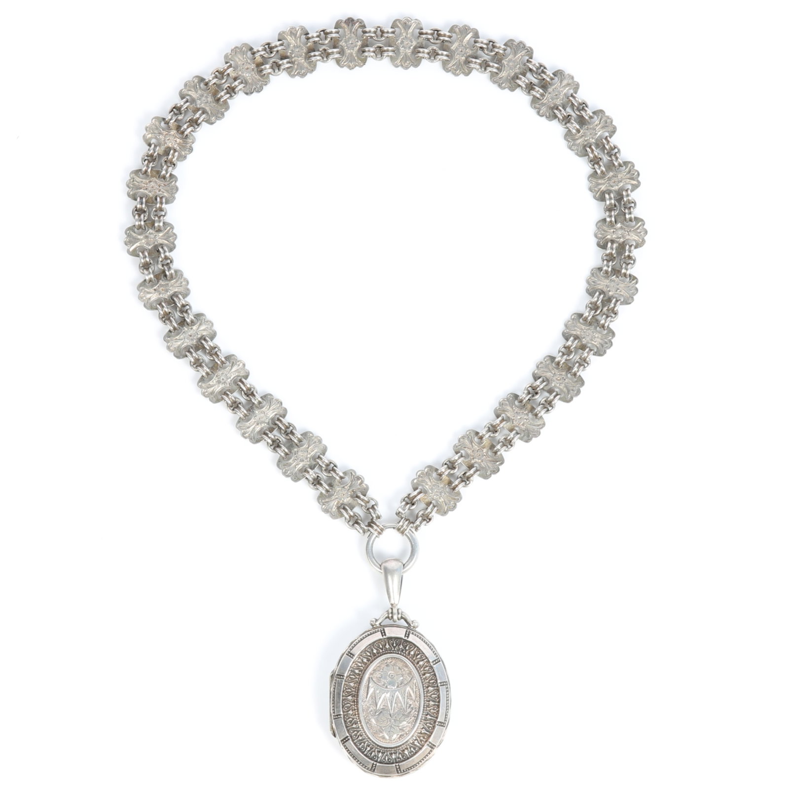 Victorian Aesthetic engraved book chain necklace with oval locket 15"L x 2 3/4"Drop: Victorian Aesthetic engraved book chain necklace with oval locket Provenance: From the Collection of Joan Duran, owner of The Queen's Bedroom on Facebook 15"L x 2 3/4"Drop