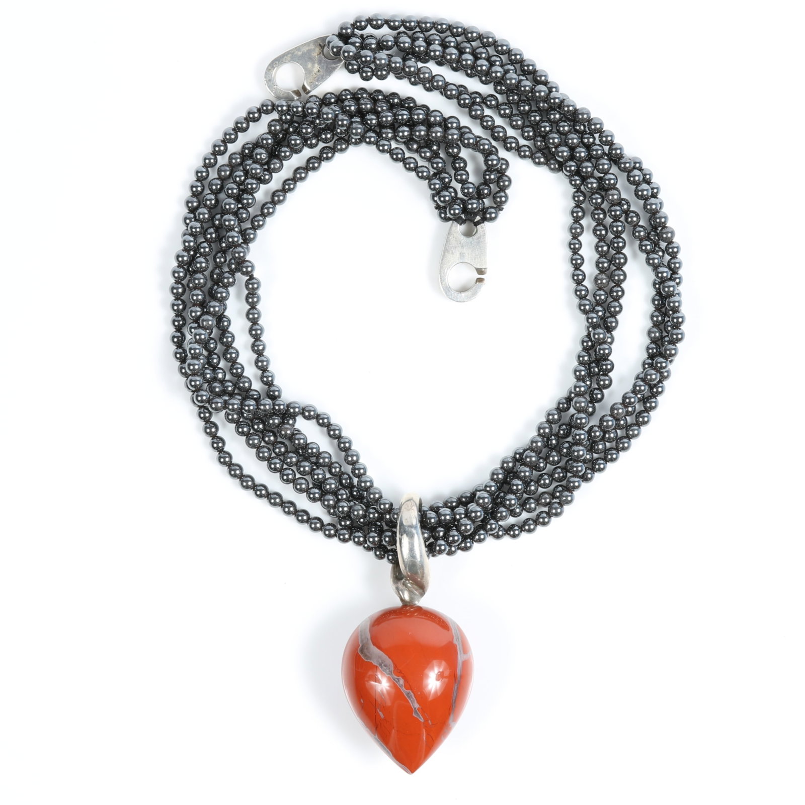 Patricia Von Musulin sterling silver multi strand hematite beaded necklace with large red jasper or: Patricia Von Musulin sterling silver multi strand hematite beaded necklace with large red jasper or carnelian drop pendant Provenance: From the Collection of Joan Duran, owner of The Queen's Bedroom o
