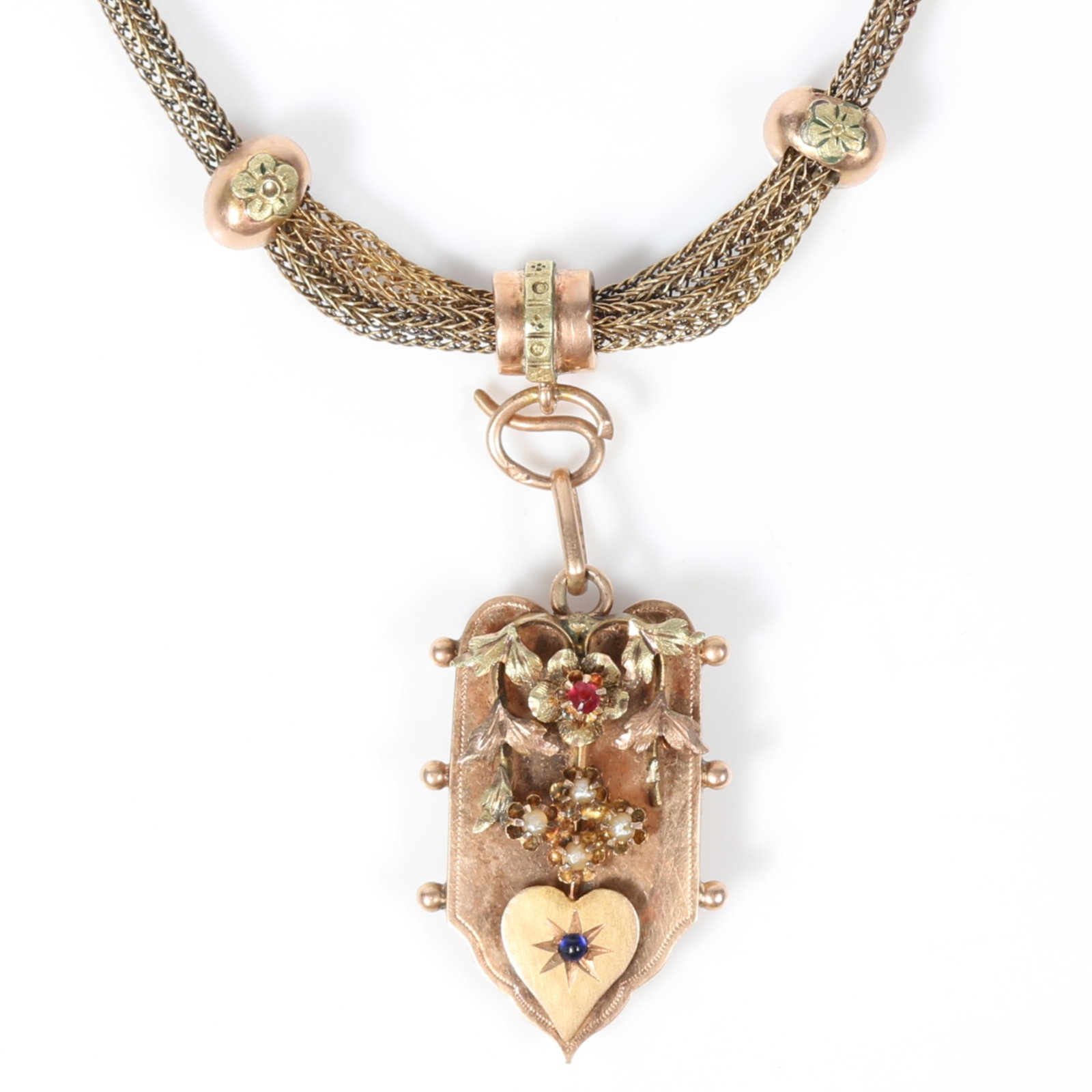 14k Victorian yellow and rose gold adjustable length necklace with floral slider locket set with: 14k Victorian yellow and rose gold adjustable length necklace with floral slider locket set with seed pearls, ruby, and sapphire on square foxtail chain 9.0 dwt. The clasp is not gold. Provenance: Fro