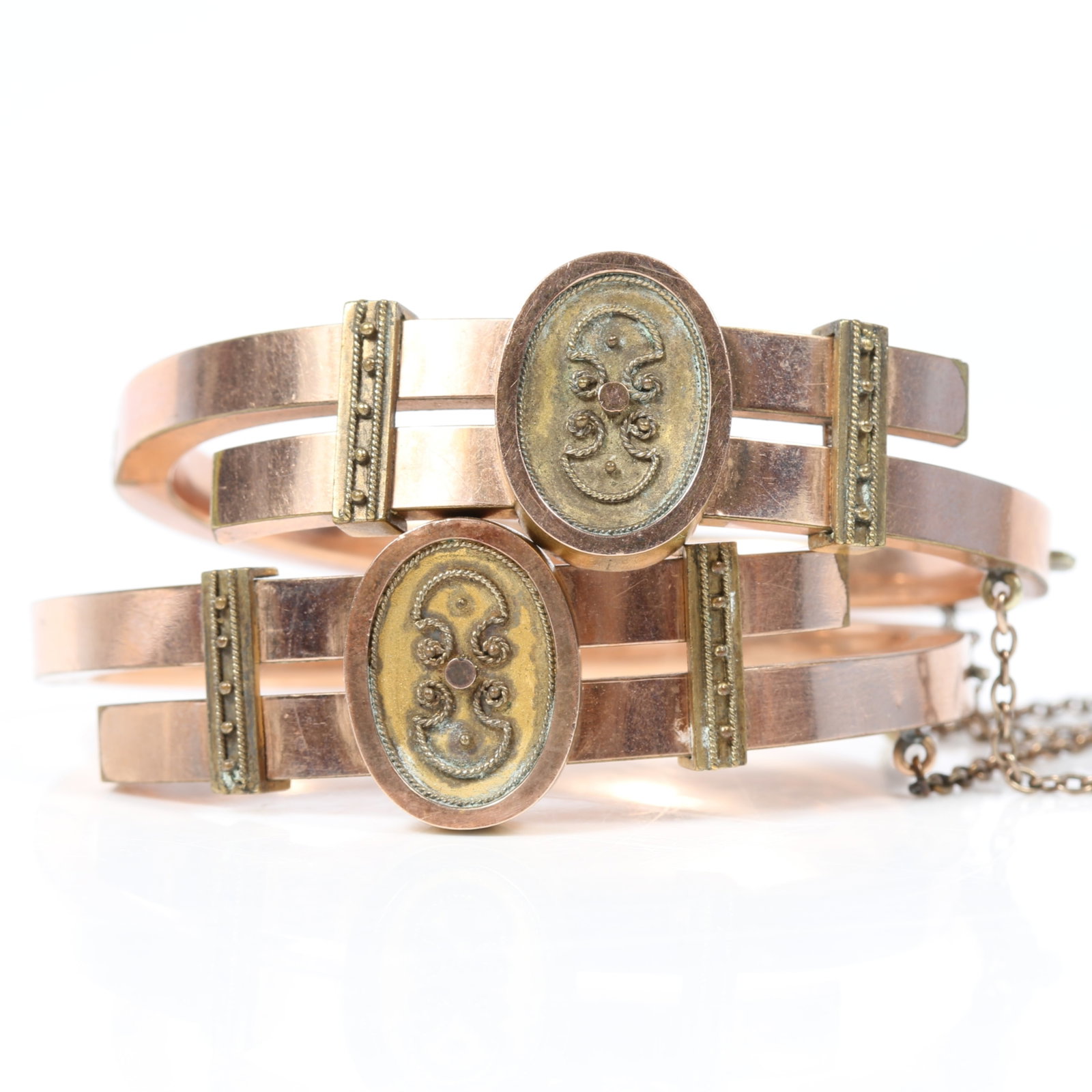 Pair of Victorian gold filled hinged wedding bangle bracelets 2 1/2"W X 2 1/8"T (outer dimensions) x: Pair of Victorian gold filled hinged wedding bangle bracelets Provenance: From the collection of Sue Rudman, owner of Antique Source, Ltd in NYC for more than 45 years. 2 1/2"W X 2 1/8"T (outer dimens