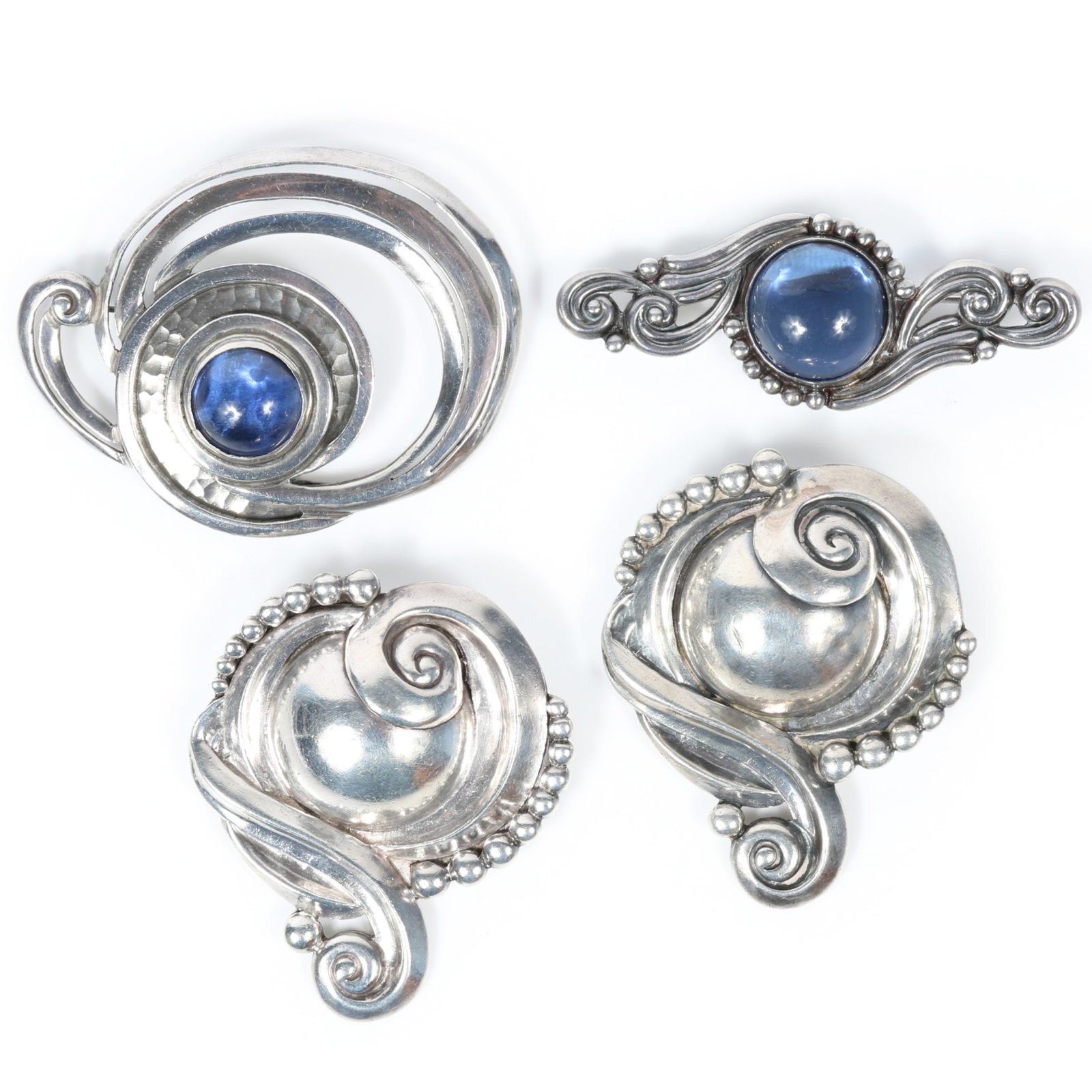 Margot de Taxco Mexican sterling silver 4pc group: pair of Wave and Scroll pattern brooches with (1 of 12)