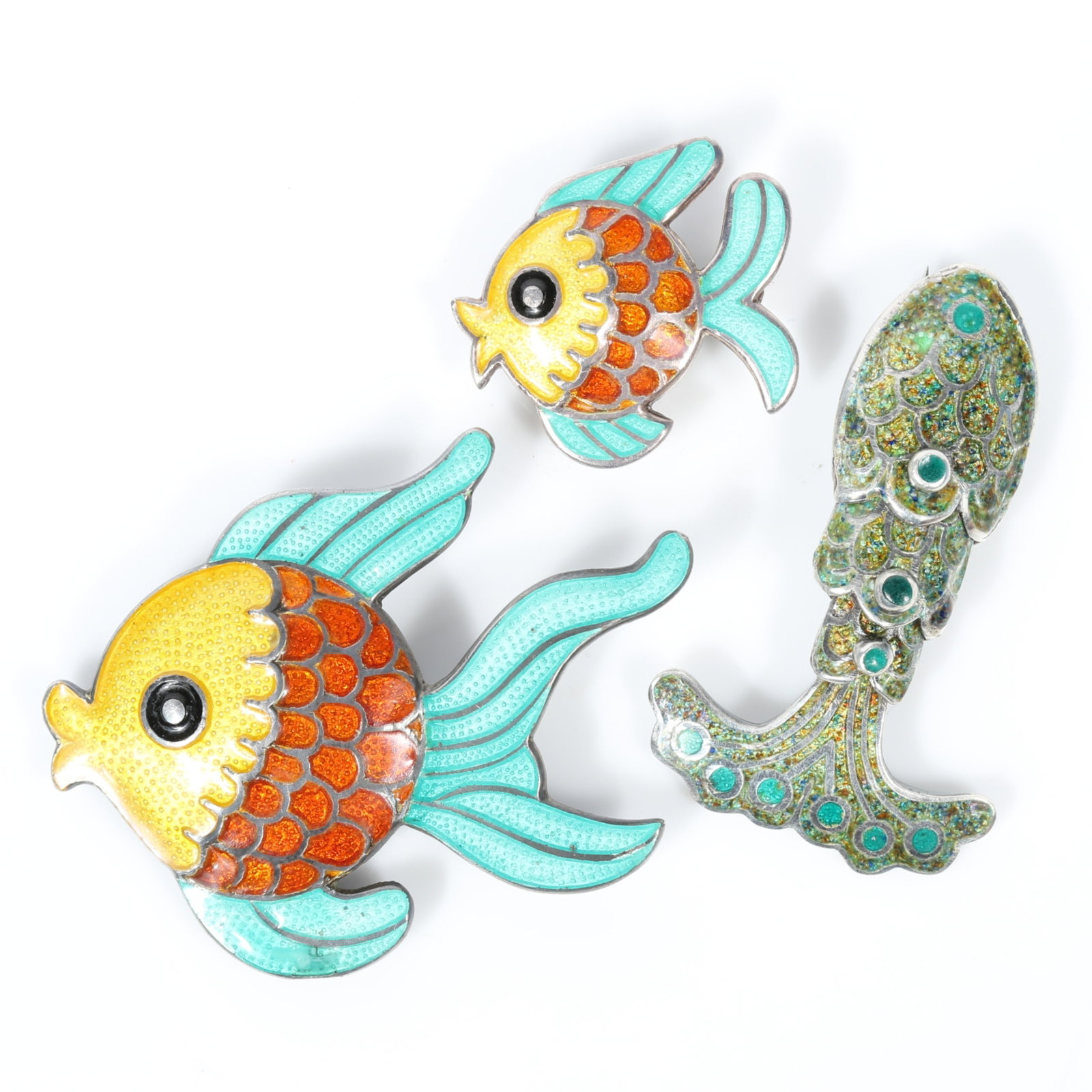 Margot de Taxco Mexican sterling silver 3pc fish brooch group including articulated green and blue: Margot de Taxco Mexican sterling silver 3pc fish brooch group including articulated green and blue enamel, and pair of brightly colored "Plump Fish" #5873 and #5698 Provenance: From the Collection of 
