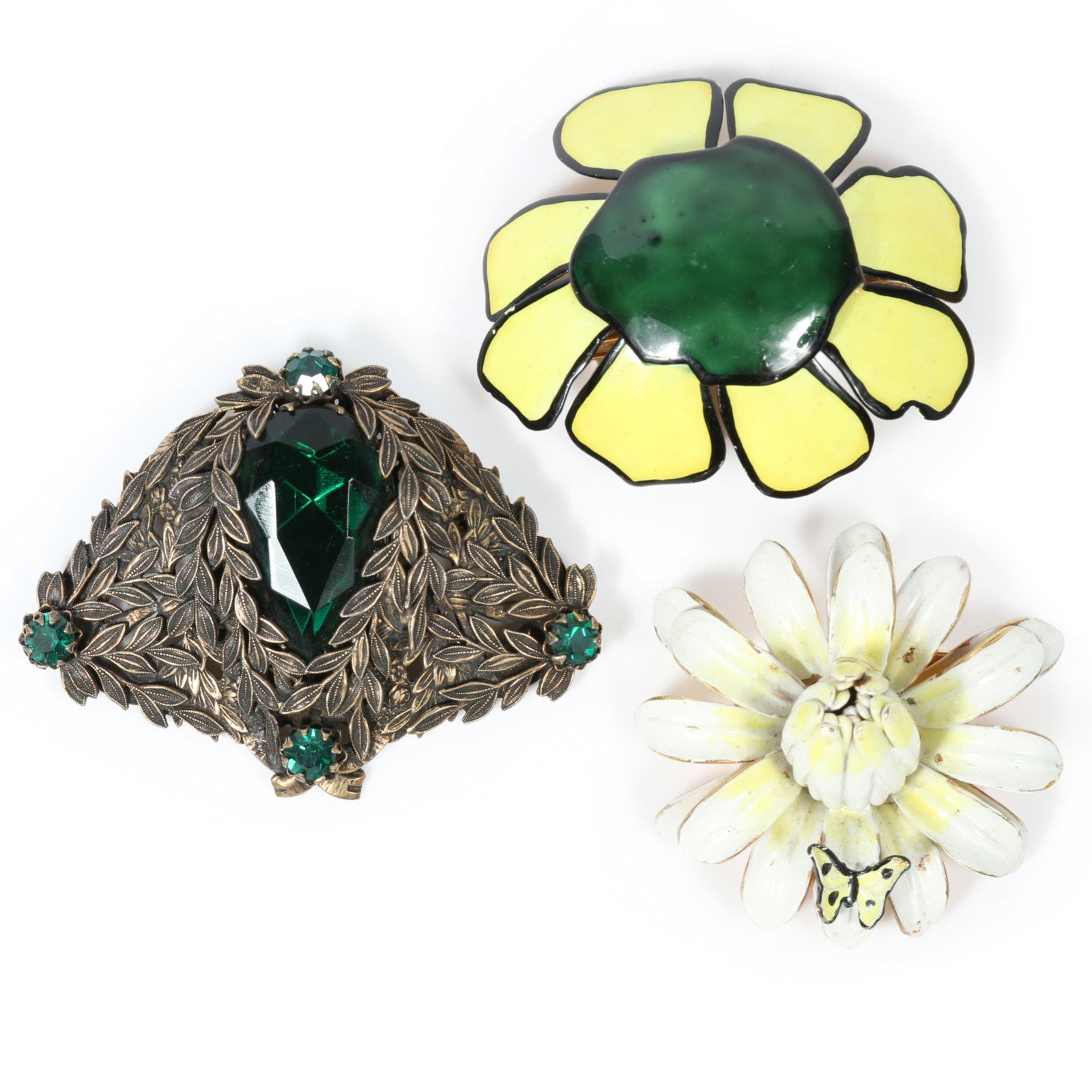 Sandor brooch 3pc group including pair of enamel floral brooches, and Art Deco style foliage brooch: Sandor brooch 3pc group including pair of enamel floral brooches, and Art Deco style foliage brooch with large green glass jewel Provenance: From the private collection of Dr. Claudia Brodhead 2 1/4"H