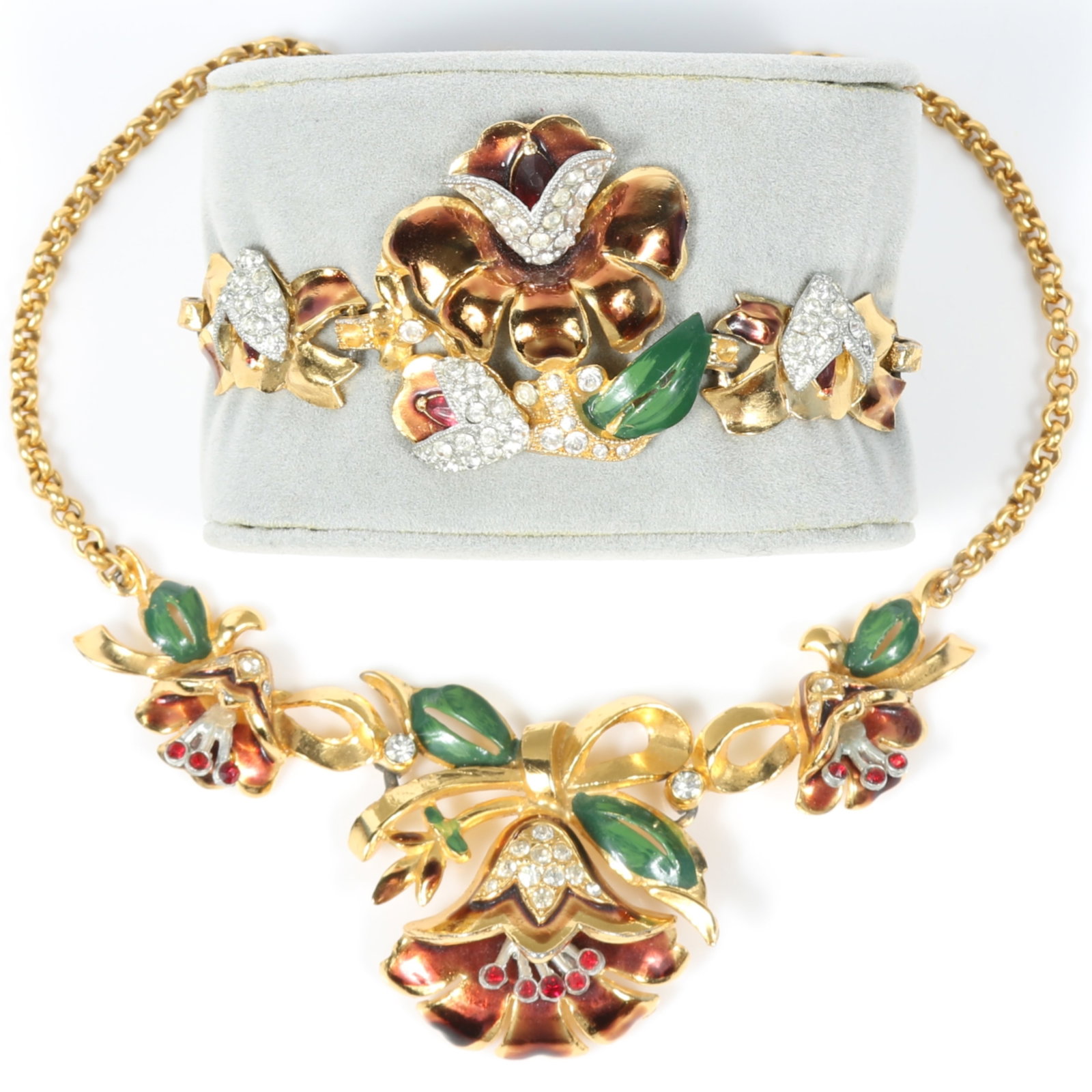 Rare Coro Adolf Katz 1939 lotus flower necklace and bracelet with enamel and pave rhinestones 15"L x: Rare Coro Adolf Katz 1939 lotus flower necklace and bracelet with enamel and pave rhinestones The clasp on the safety chain is pinched shut 15"L x 1 3/4"Drop (necklace)