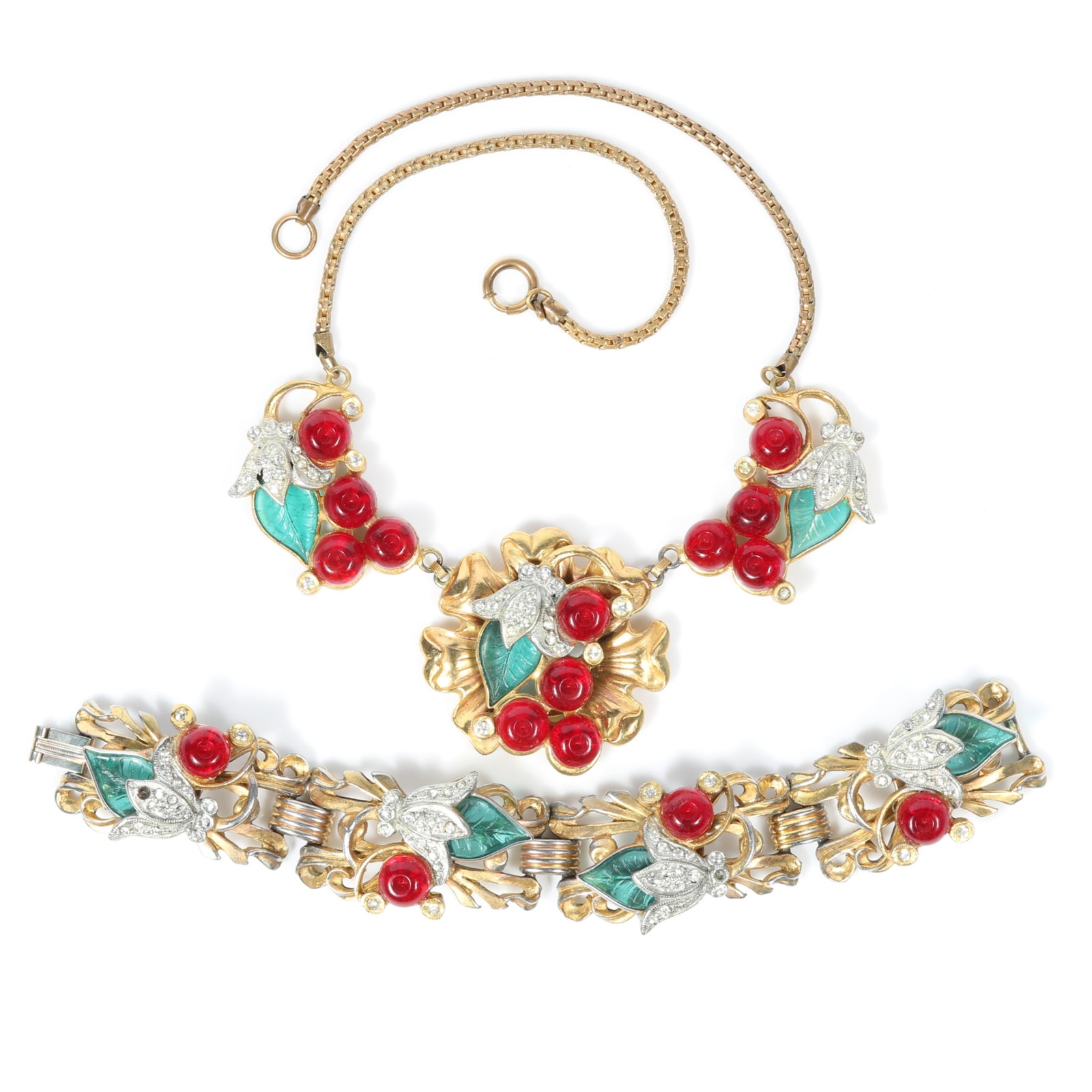 Coro? Retro necklace and matching bracelet with molded glass leaves, red glass berries, and pave: Coro? Retro necklace and matching bracelet with molded glass leaves, red glass berries, and pave rhinestone detail several gems missing on bracelet Provenance: From the private collection of Dr. Claud