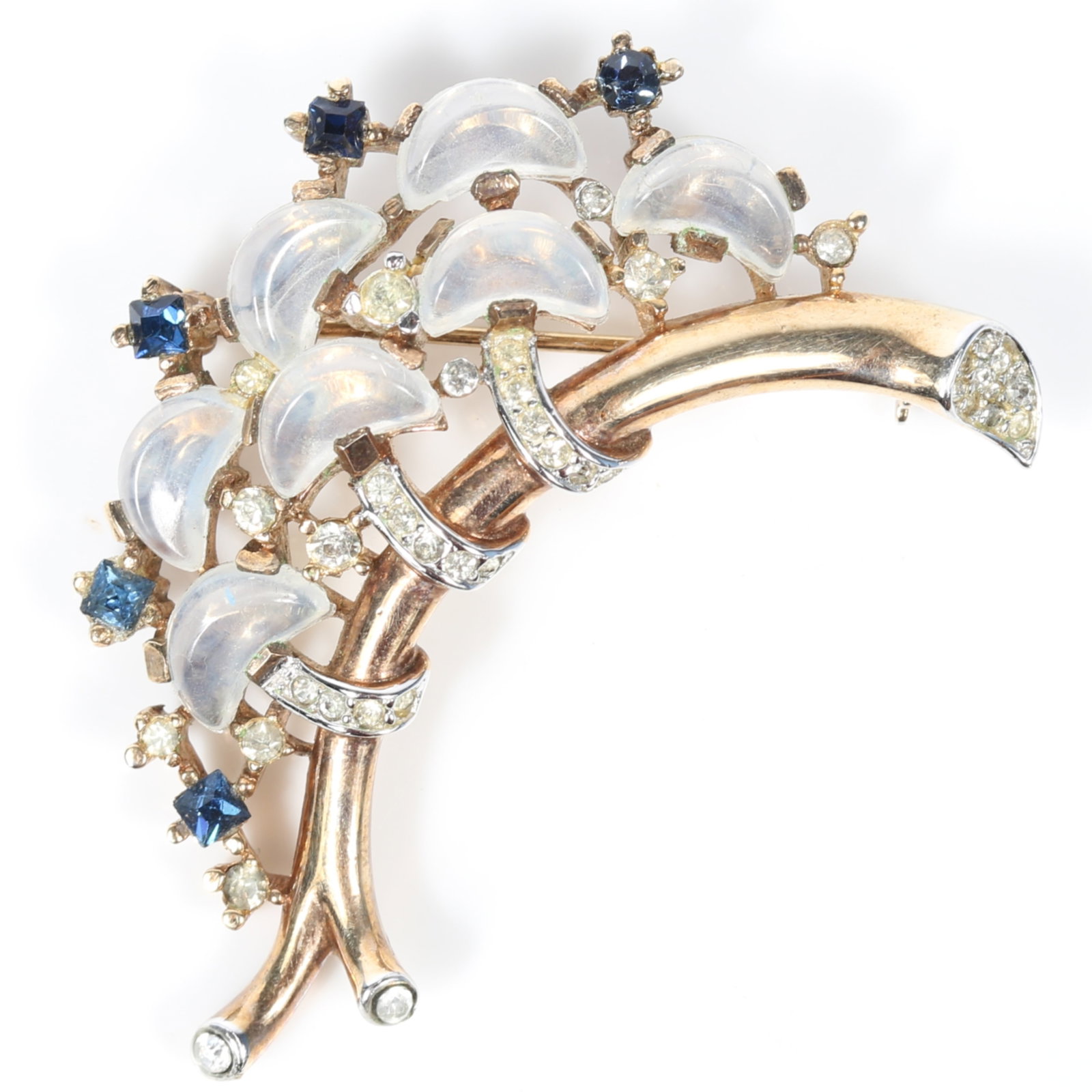 Trifari 1950 Alfred Philippe Claire de Lune branch pin brooch with moonstone crescent jewels,: Trifari 1950 Alfred Philippe Claire de Lune branch pin brooch with moonstone crescent jewels, diamante, and sapphire blue crystals. Provenance: From the collection of Sue Rudman, owner of Antique Sour