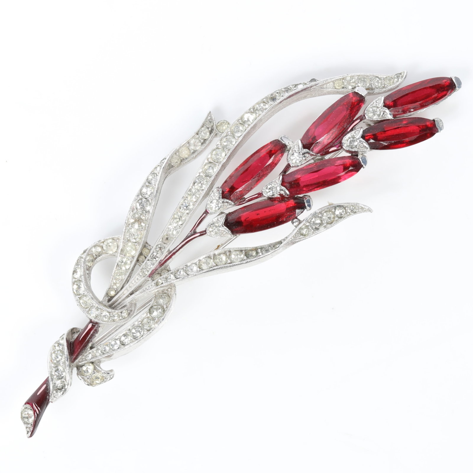 Trifari Alfred Spaney 1941 flower spray with red enamel branch and red marquise cut stones, book: Trifari Alfred Spaney 1941 flower spray with red enamel branch and red marquise cut stones, book piece American Costume Jewelry Vol. 2 by Carla Ginelli Brunialti & Roberto Brunialti pg. 108 4"H x 1 1/