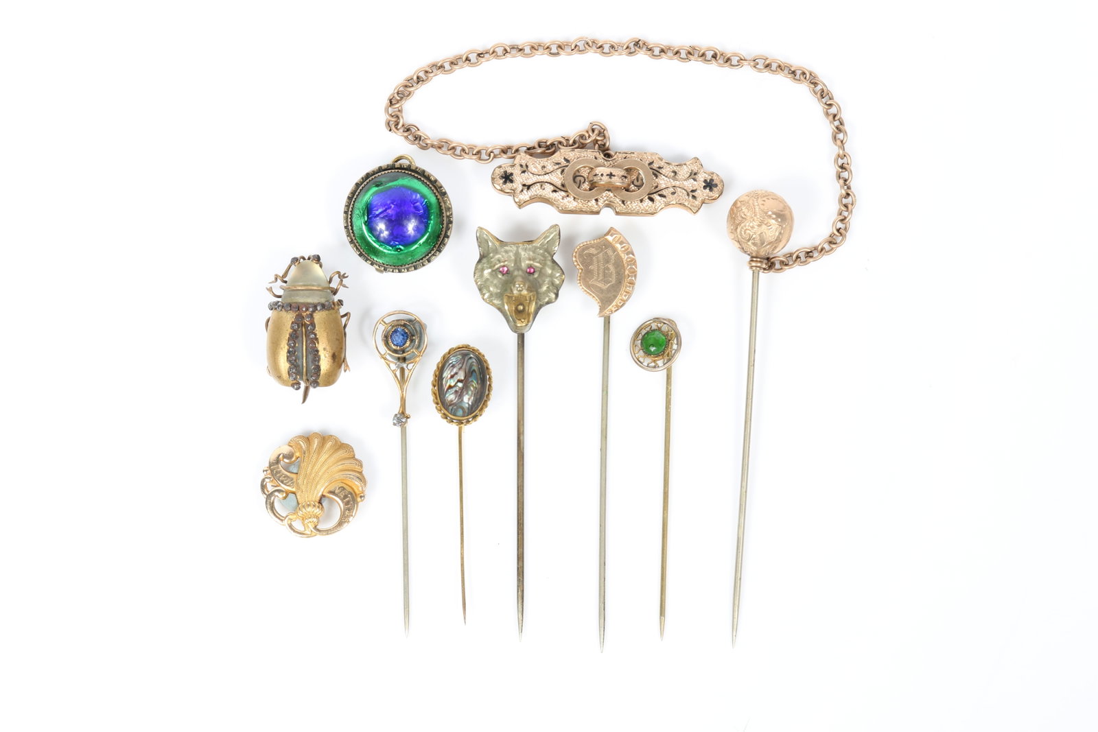 9pc Victorian stick pin and brooch group including glass and cut steel bug brooch, peacock eye, 10k (1 of 13)