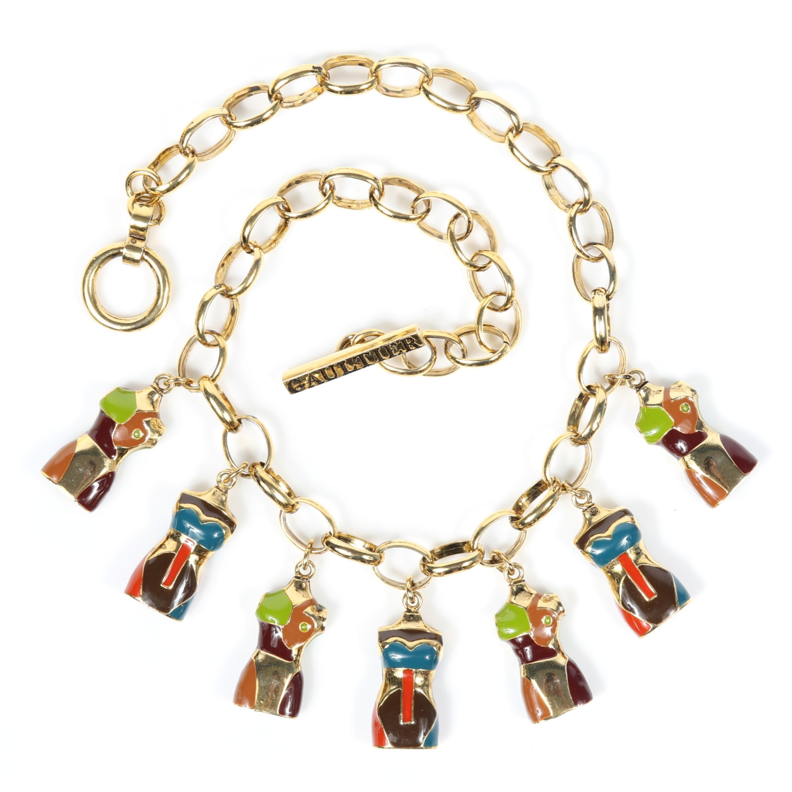 Jean Paul Gaultier French couture iconic enamel bust charm necklace featuring gold-tone hardware and: Jean Paul Gaultier French couture iconic enamel bust charm necklace featuring gold-tone hardware and colorful torso charms Provenance: From the private collection of Dr. Claudia Brodhead 21"L x 2"Drop