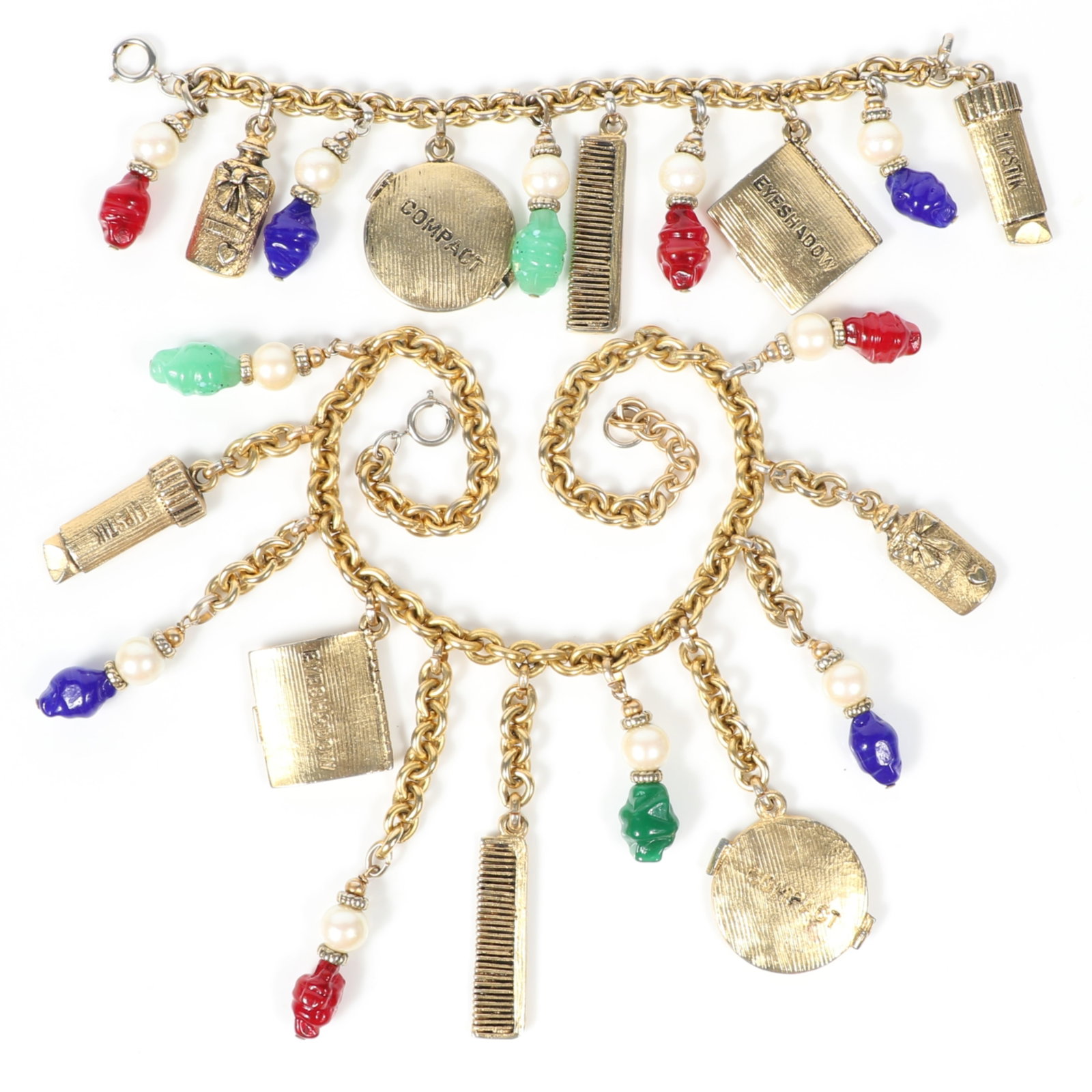 Moschino haute couture make-up themed charm necklace and matching bracelet with faux pearl and art: Moschino haute couture make-up themed charm necklace and matching bracelet with faux pearl and art glass drops Provenance: From the private collection of Dr. Claudia Brodhead 18"L x 4"Drop (necklace)