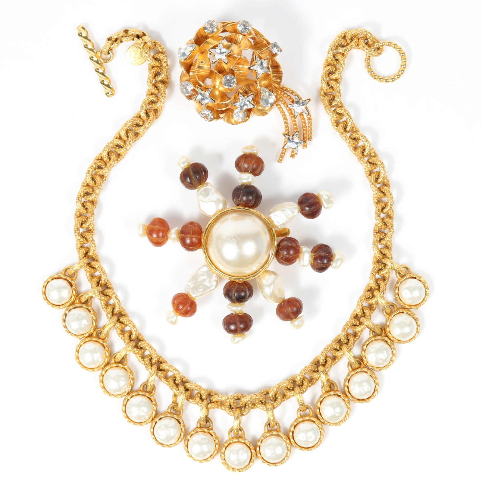 Dominique Aurientis French couture 3pc group including faux pearl fringe drop necklace, dimensional: Dominique Aurientis French couture 3pc group including faux pearl fringe drop necklace, dimensional rhinestone shooting star brooch, and large faux pearl brooch Provenance: From the private collection
