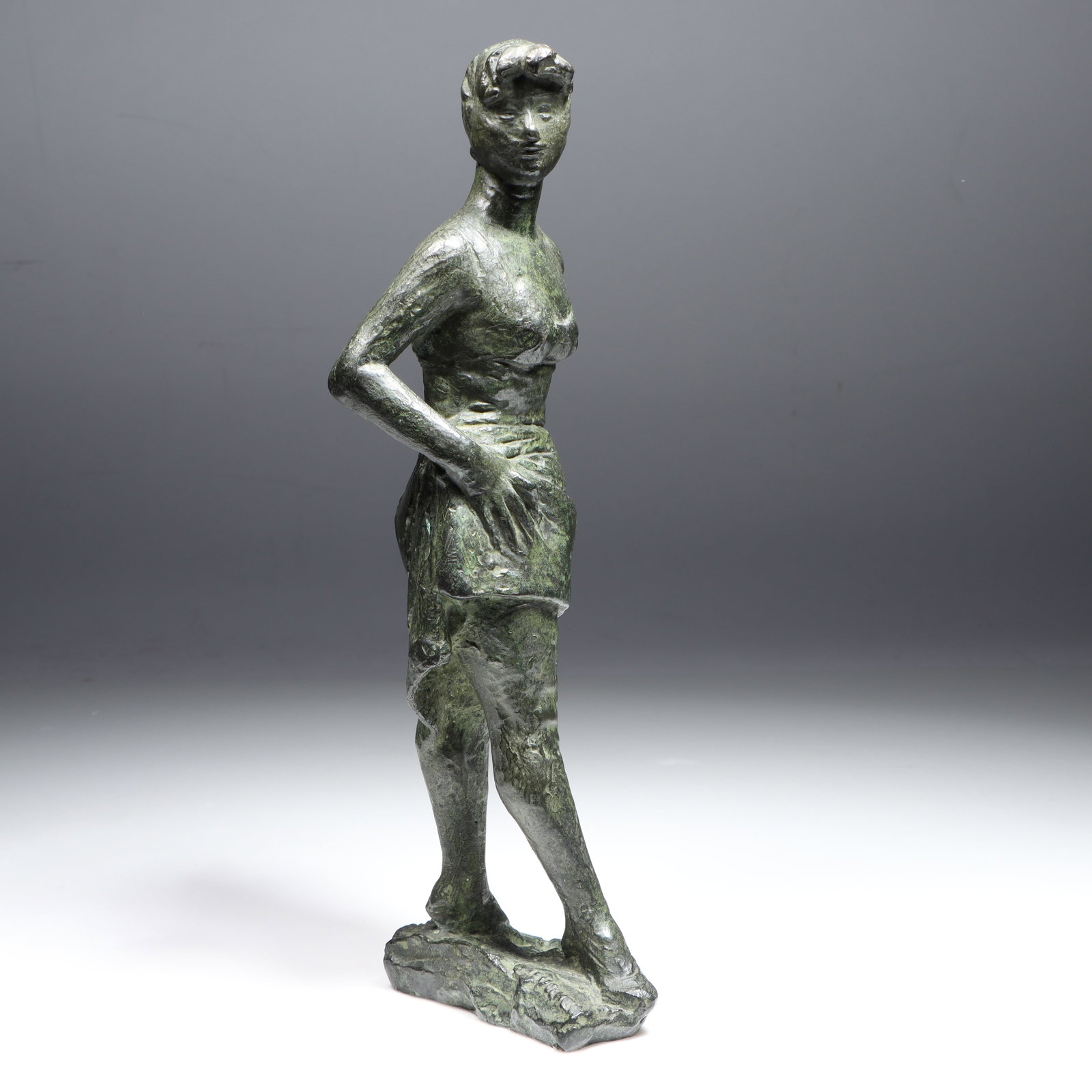 Bruno Lucchesi, Italian American (1926-2026), Standing Bather with Ponytail, patinated bronze, 10: Bruno Lucchesi Italian American (1926-2026) Standing Bather with Ponytail patinated bronze Inscribed signature on base. Biography from the Archives of askART: A genre and figure sculptor, Bruno Lucche