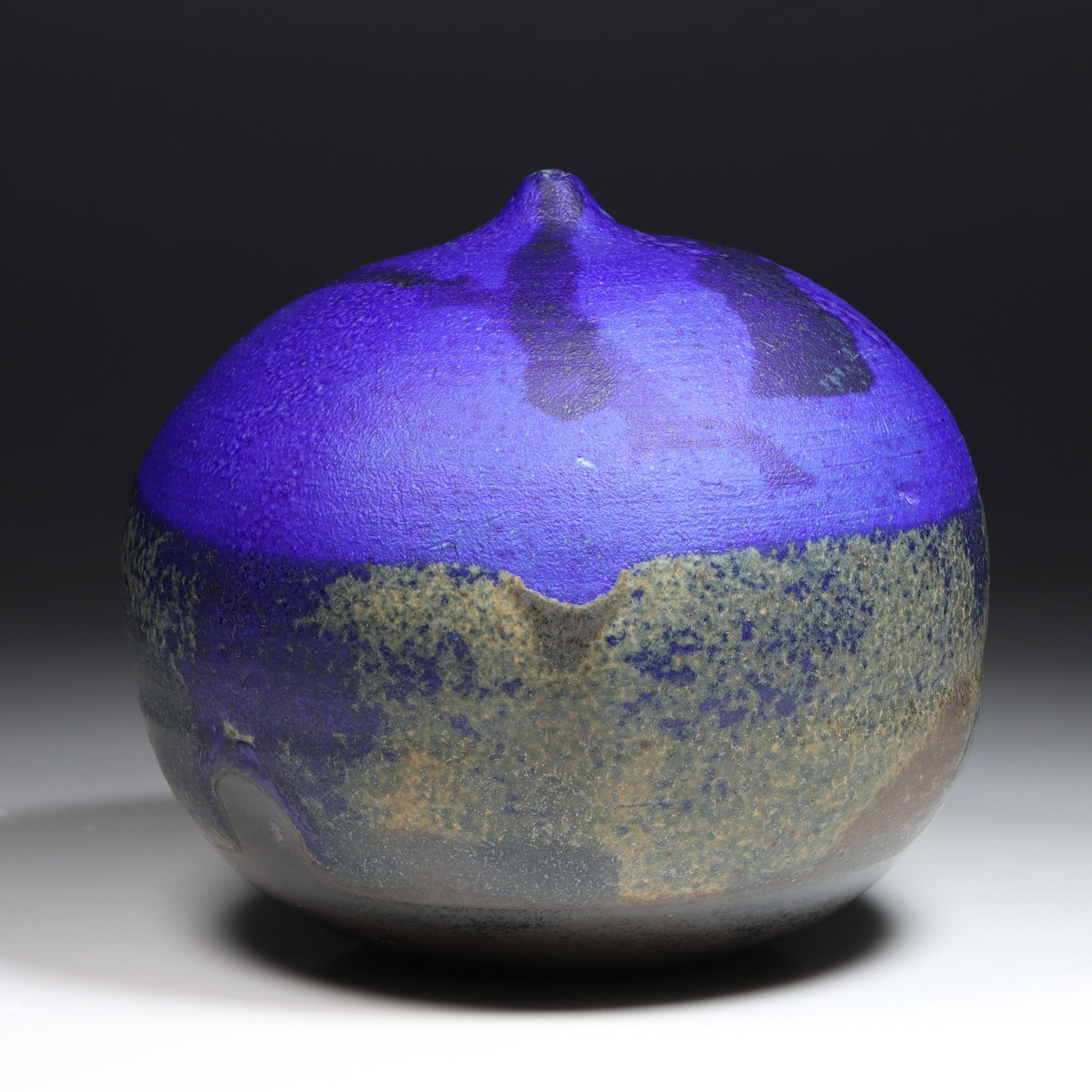 Toshiko Takaezu, American (1922-2011), closed form moon pot with rattle, glazed stoneware, 5 1/4"H x: Toshiko Takaezu American (1922-2011) closed form moon pot with rattle glazed stoneware incised signature under base. Biography from the Archives of askART: Toshiko Takaezu (June 17, 1922 ? March 9, 20