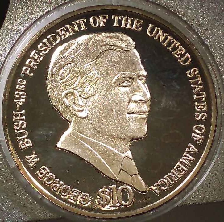 UNITED STATES GEORGE BUSH 10 DOLLAR COIN SET: Issuer Liberia Period Republic (1847-Date) Type Non-Circulating Coin Year Composition Copper-Nickel Weight 14.6g Diameter 33 Mm Shape Round Technique Milled Orientation Medal Alignment Commemorative I